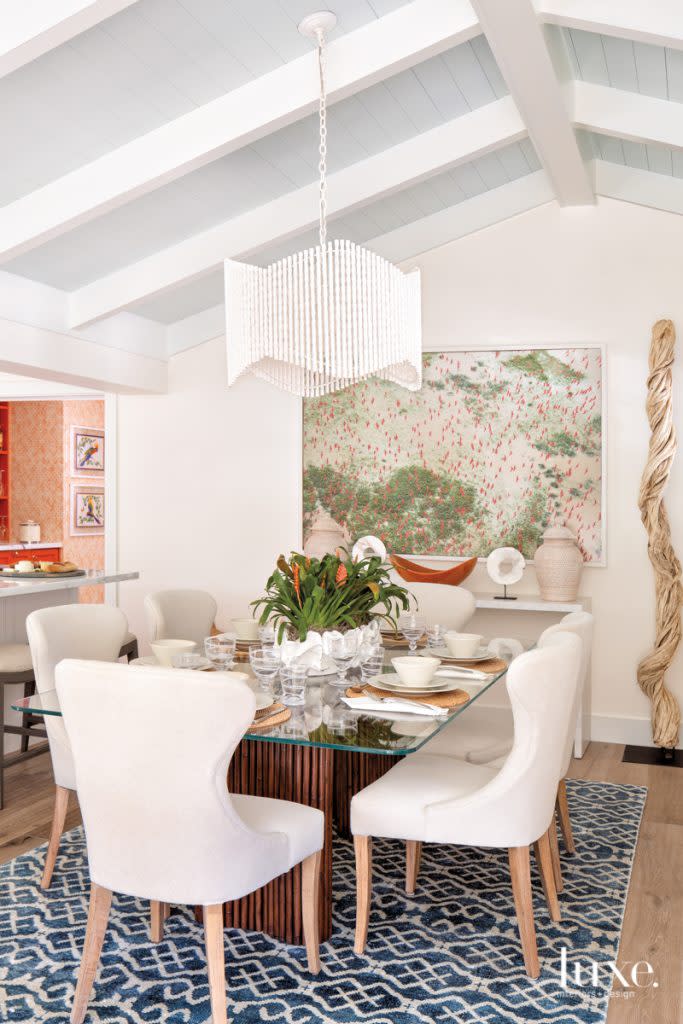 dining table with daniel beltra photograph and mother-of-pearl sideboard