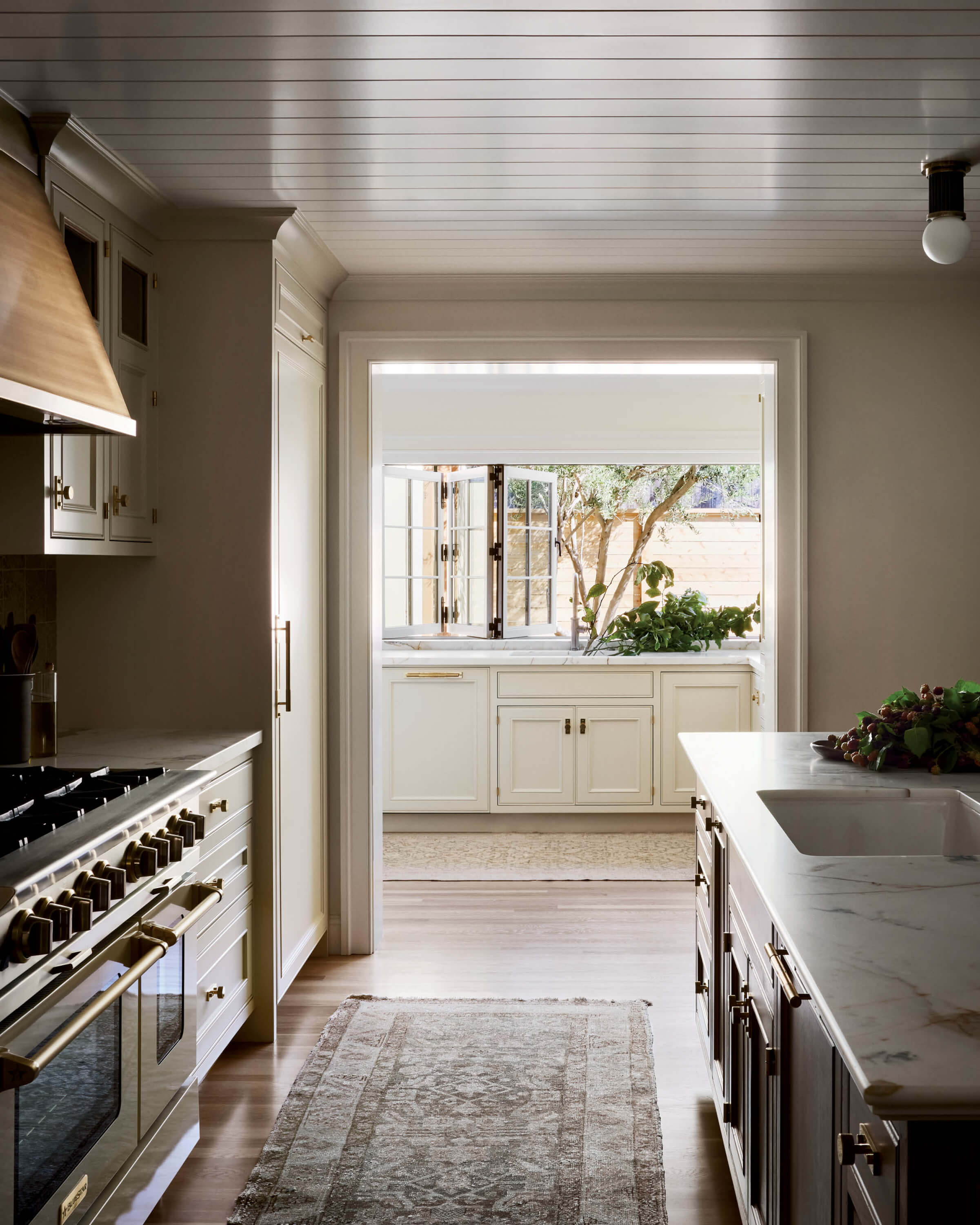 prep kitchen with cabinets painted in Farrow & Ball’s String 