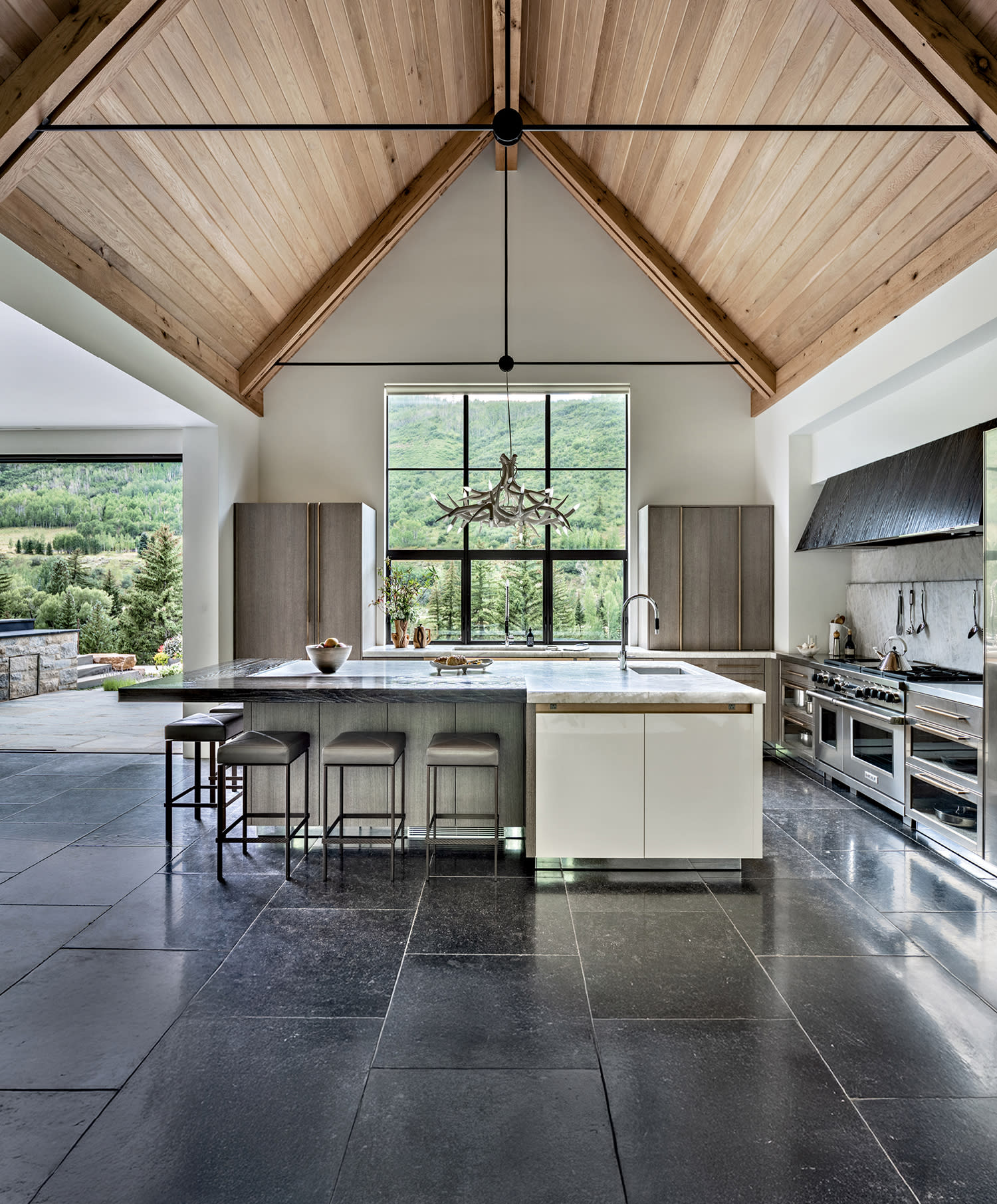 contemporary mountain kitchen with high ceilings