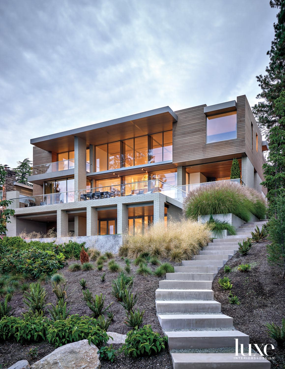 rear facade view of modern house with stairway running alongside