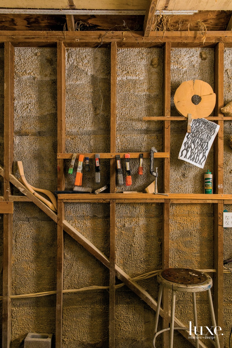 wall in Caprice Pierucci's brown shed with knickknacks around