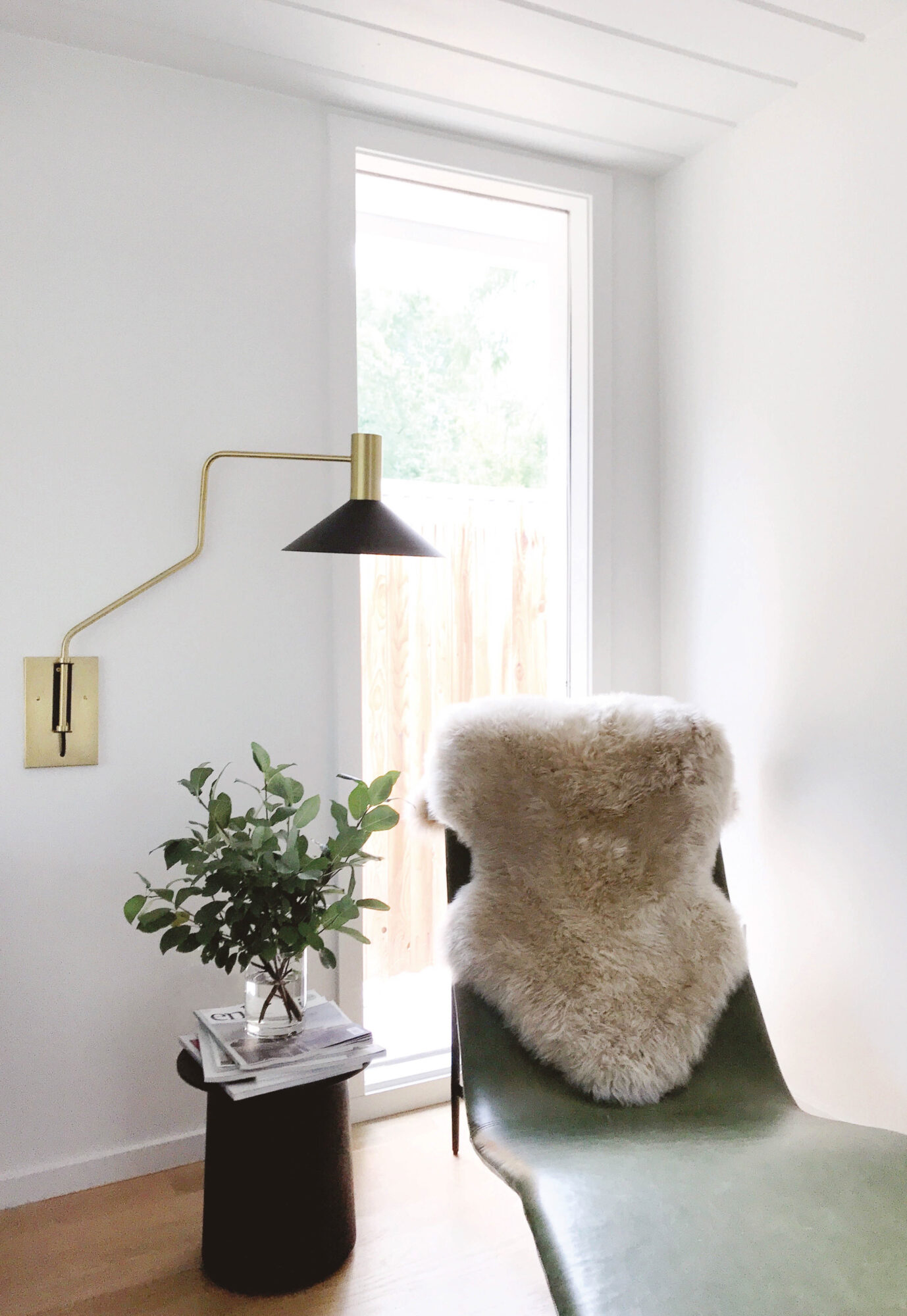 seating area with lounger and cozy blanket