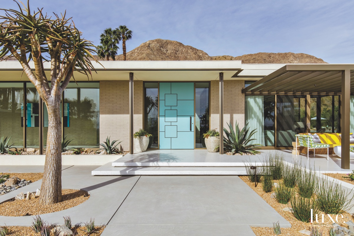 mid-century modern exterior neutral entry blue door