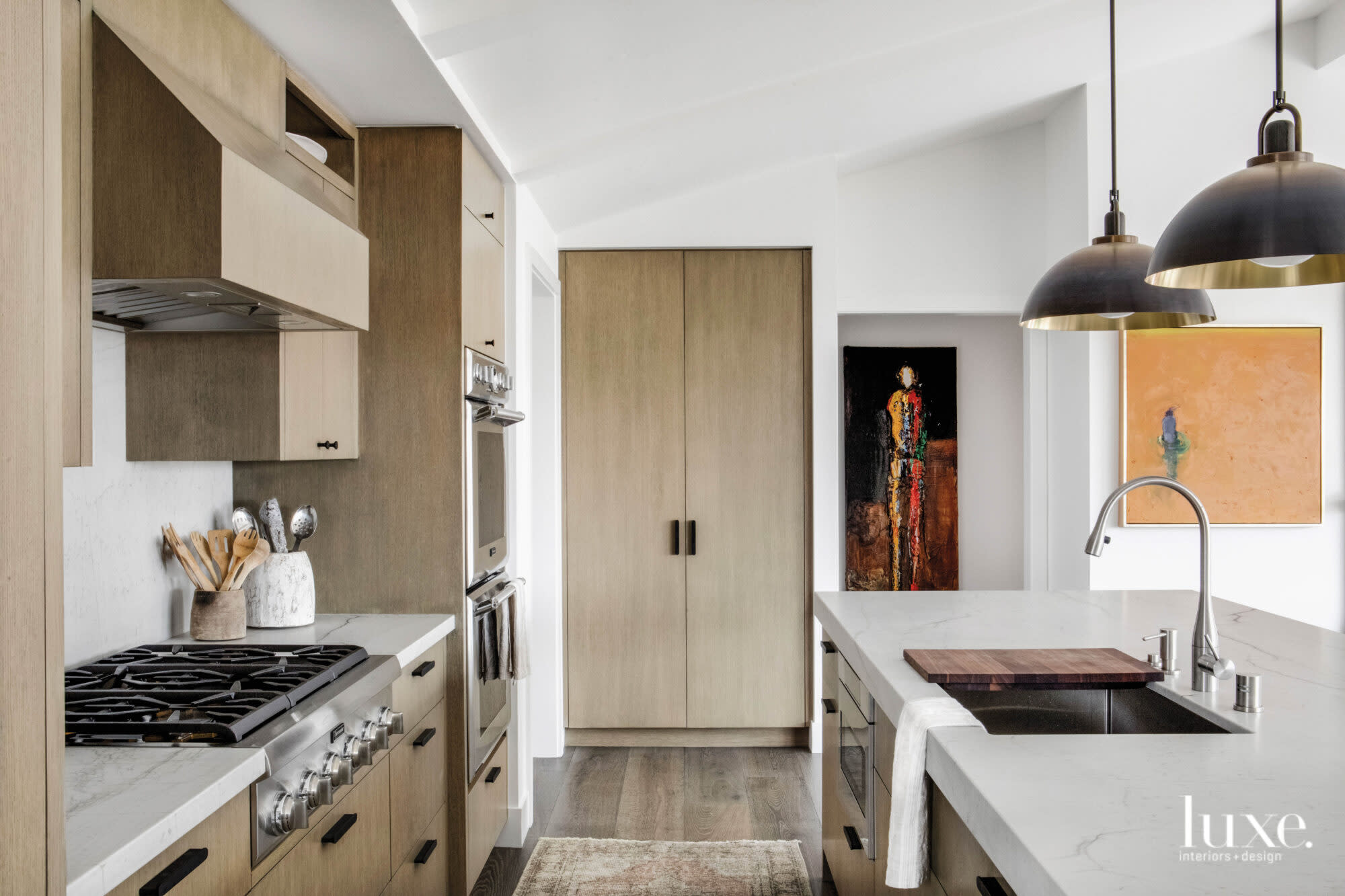 Shot of kitchen looking to range and cooktop