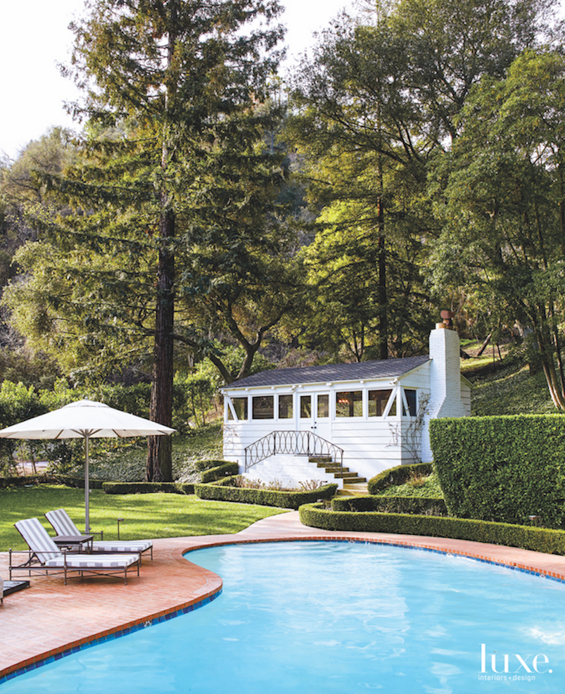 The home, commissioned from Neff by Judy Garland when the actress was just 17, includes a writer's cabin at the back of the property. The charming retreat overlooking the pool area now functions as the husband's home office.