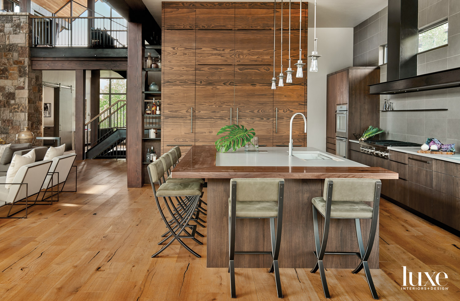 The kitchen features wood with a distinctive grain.