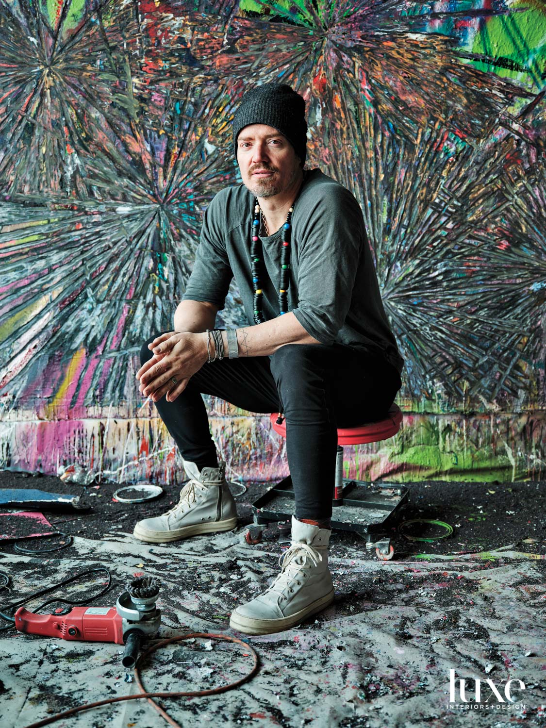 Andrew Jensdotter sits in his studio.