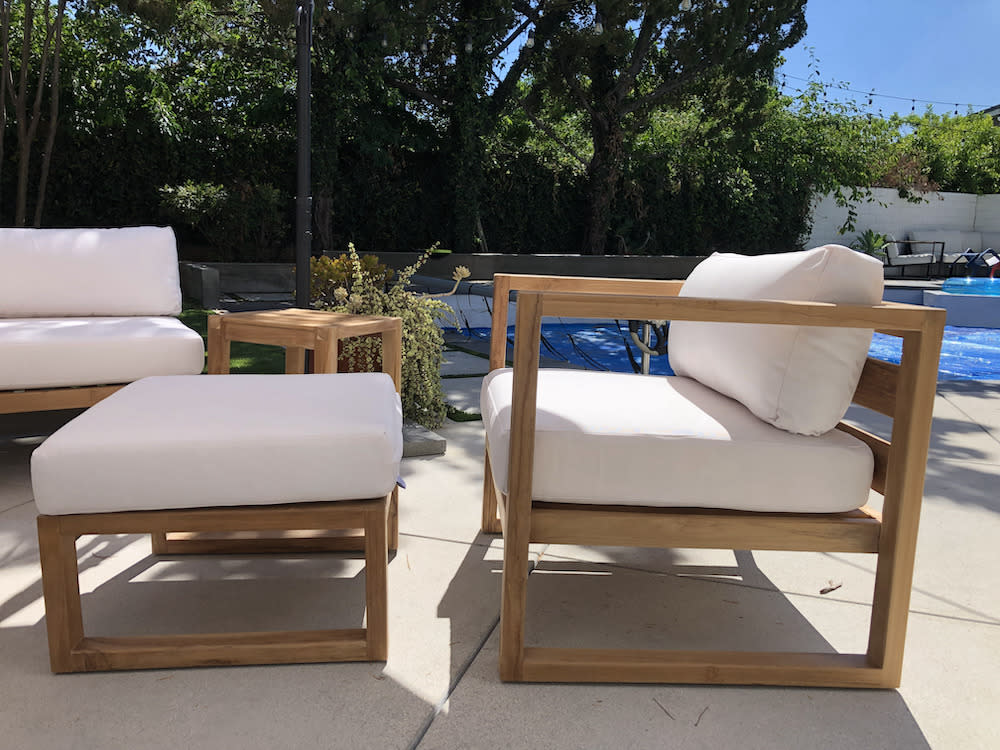 Teak Outdoor Patio Furniture with white cushions on outdoor patio by Willow Creek Designs in Los Angeles, California