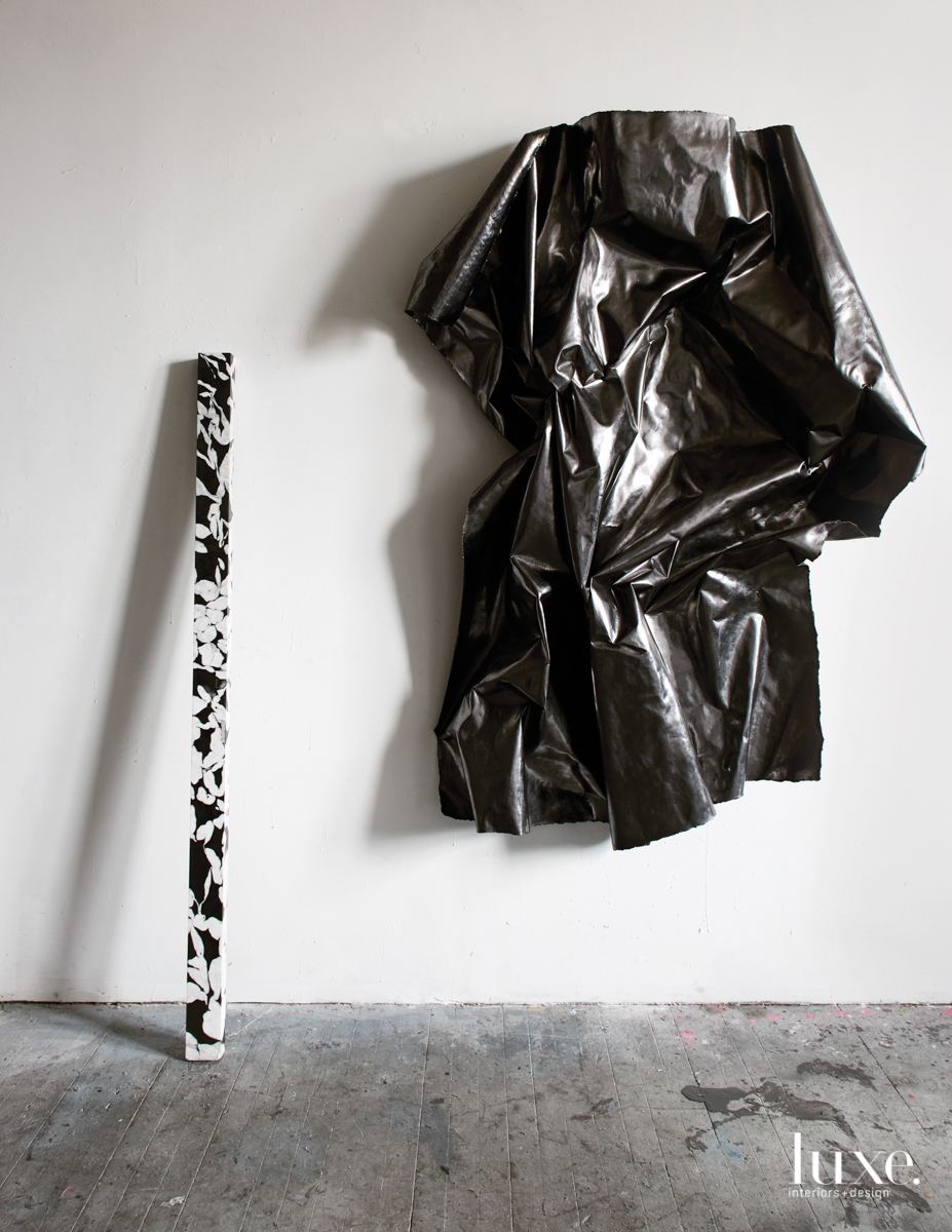 Seiden's graphite-on-marble Strata Drawing (No.3) (left) leans against the wall beside Ultimate Shield (She-Ra She Shield), done in graphite on hardened paper.