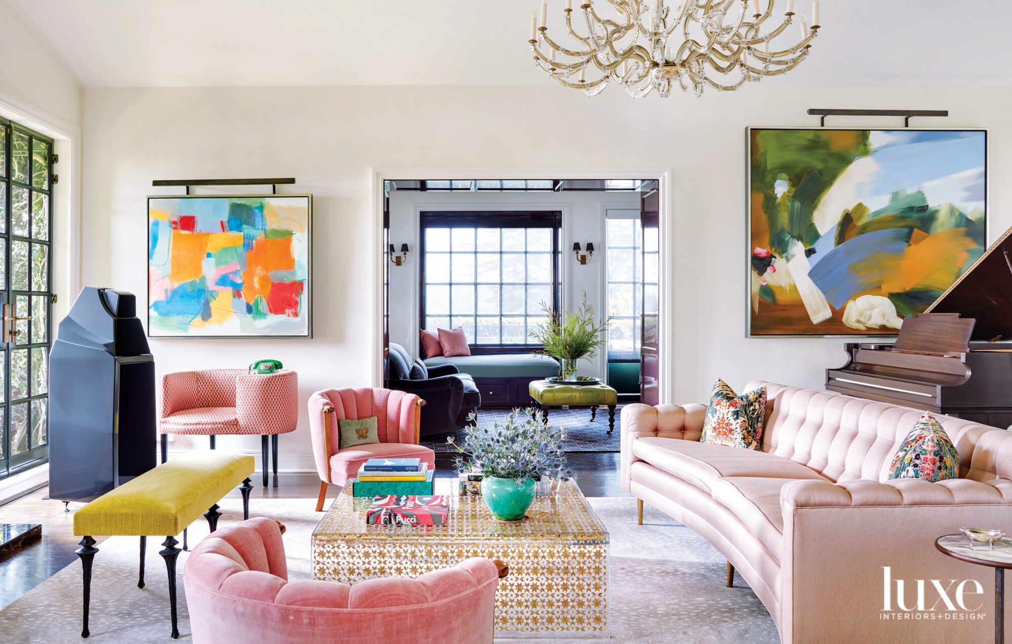 Living room with pink sofa and lounge chairs