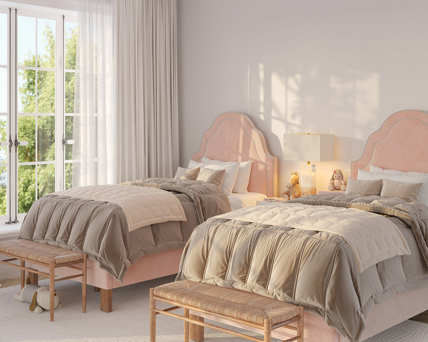 A cozy bedroom with two twin beds featuring soft pink headboards and beige comforters. A large window with sheer curtains lets in natural light, creating a serene atmosphere.
