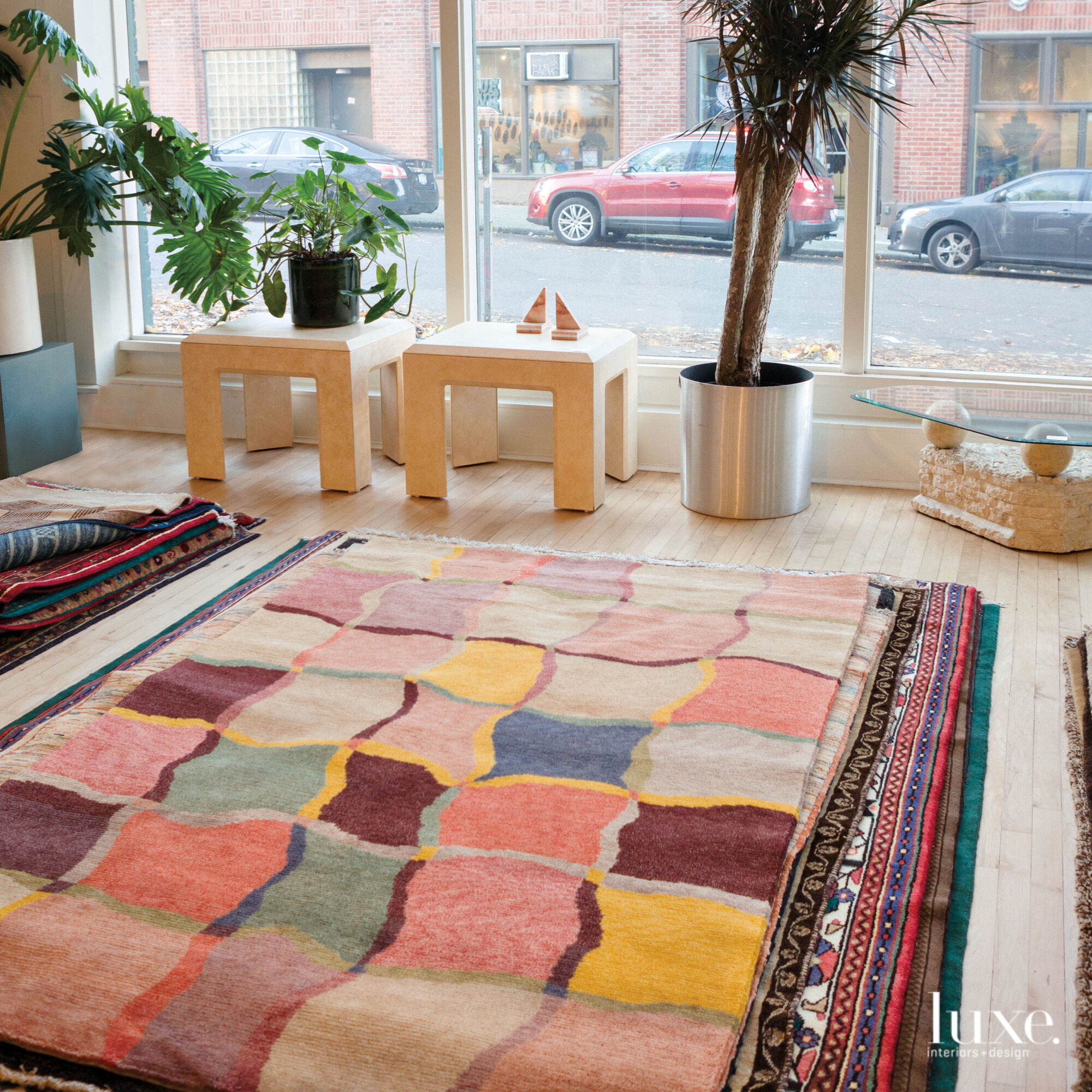 A colorful patterned rug sits center stage in this shop