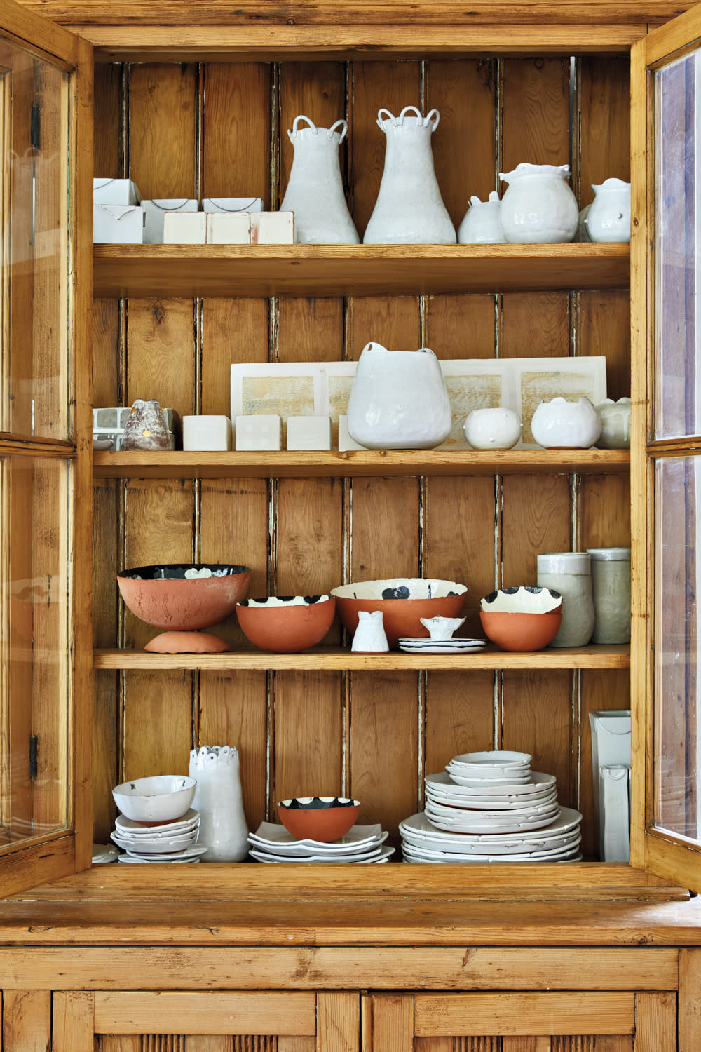 ceramic vessels on shelf