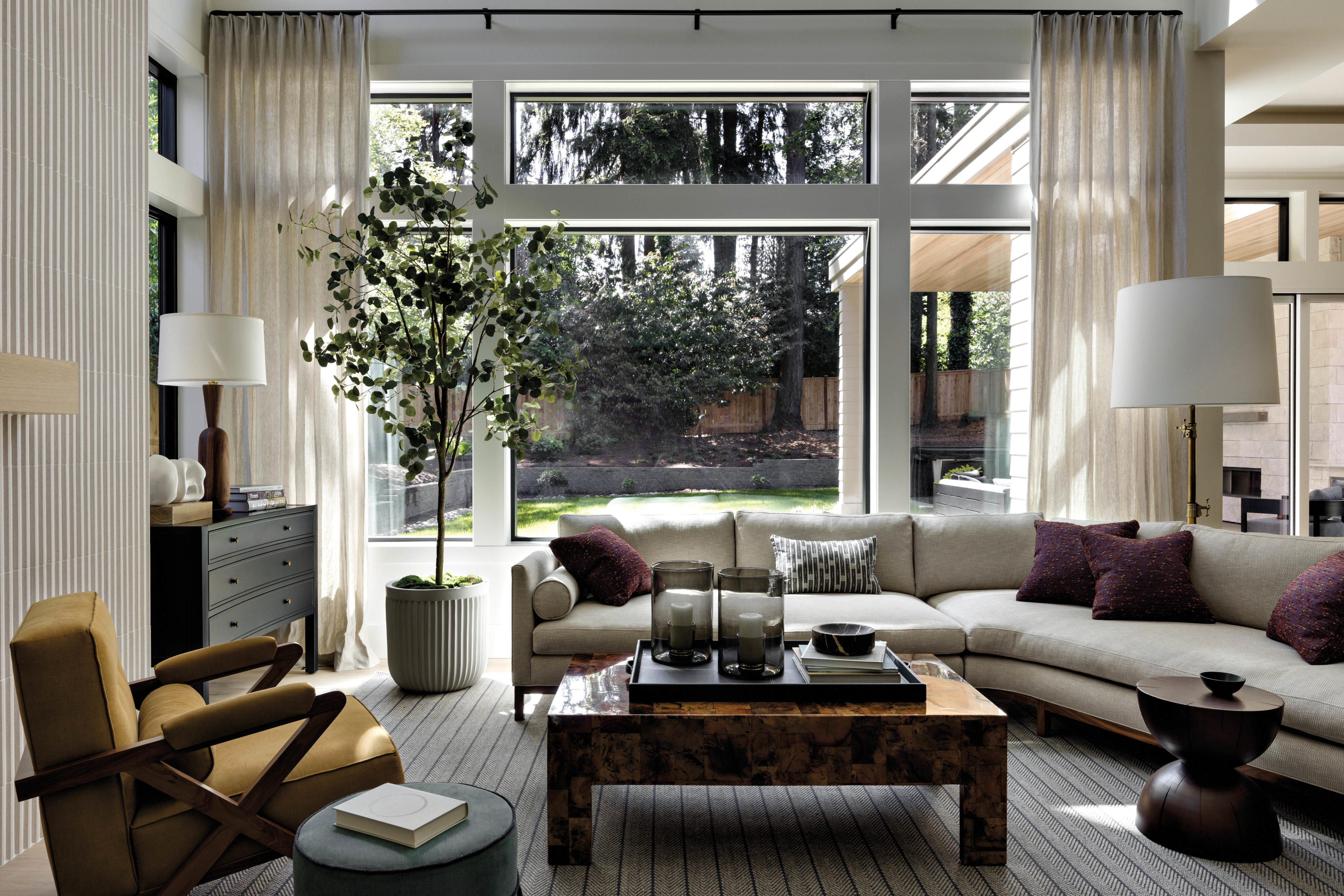 forest views seen through the window of a Washington home's living room