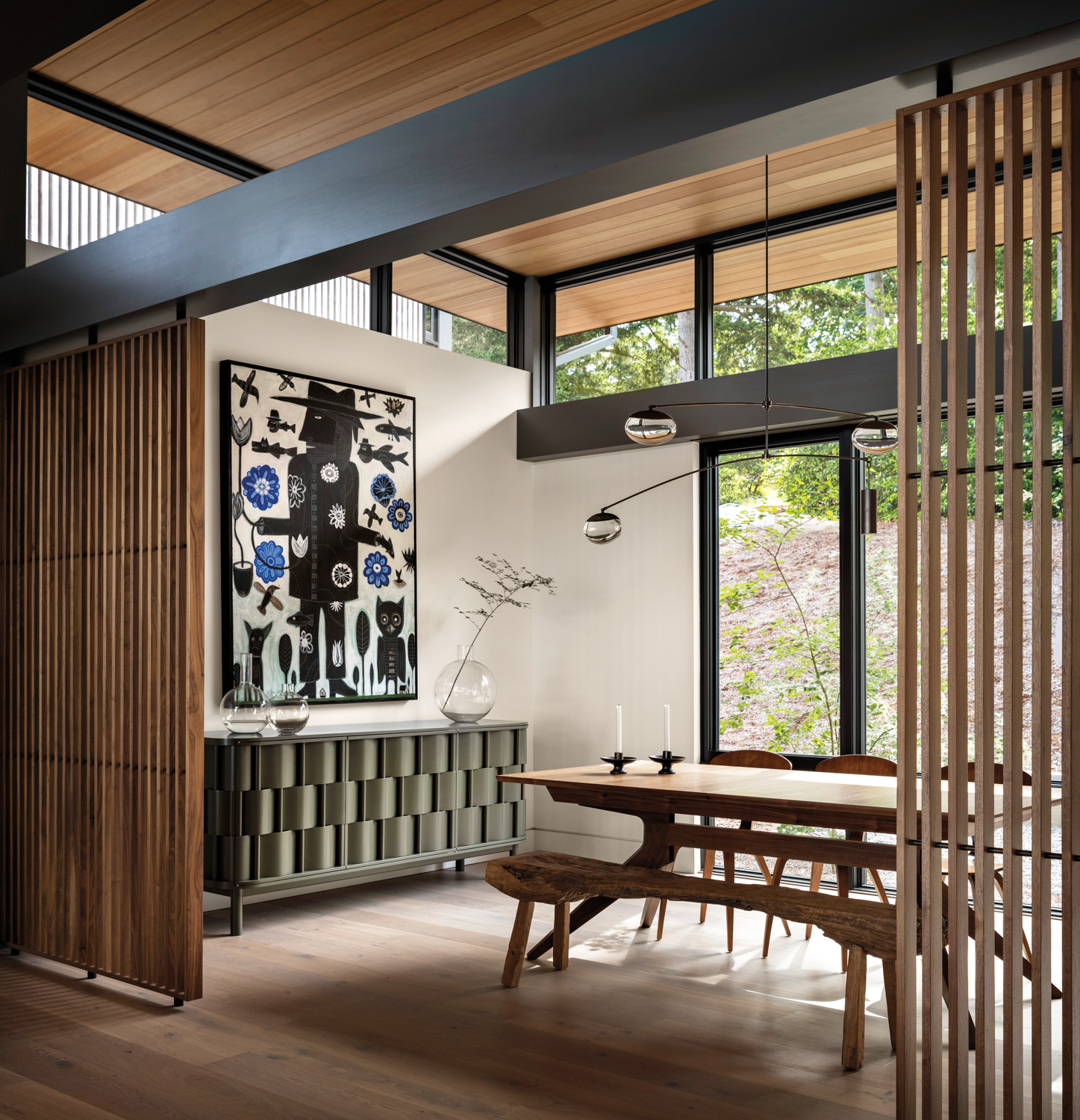 Vertical slats define the passage to this home's dining room.