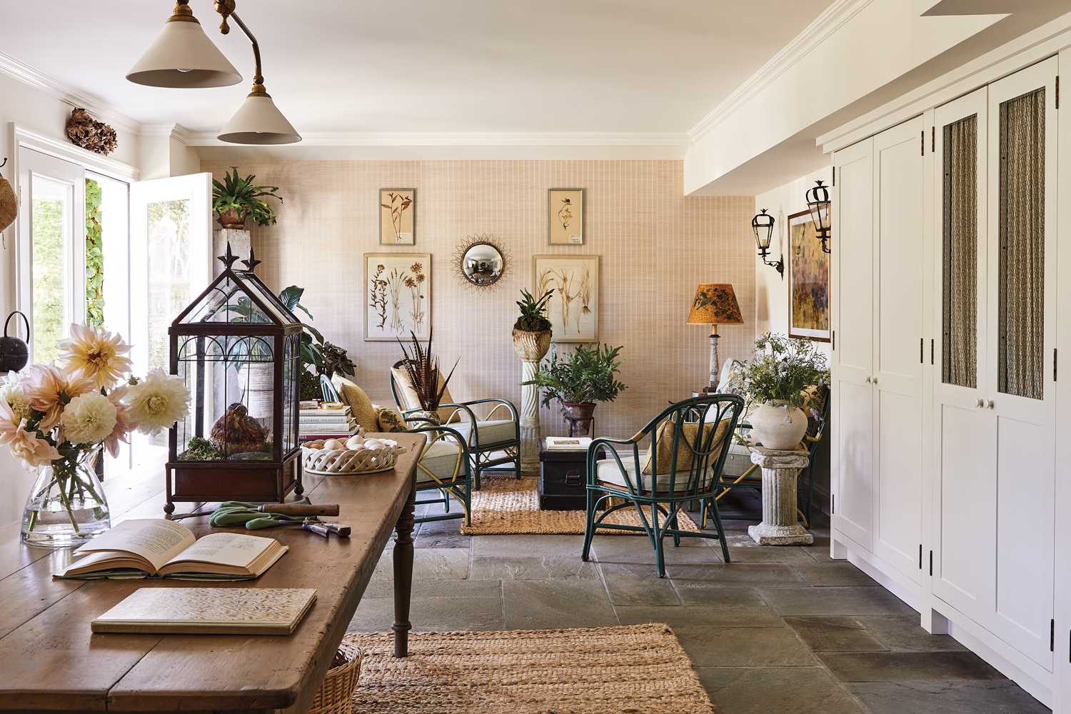 neutral, Victorian-inspired gardening space with pressed flowers and vases