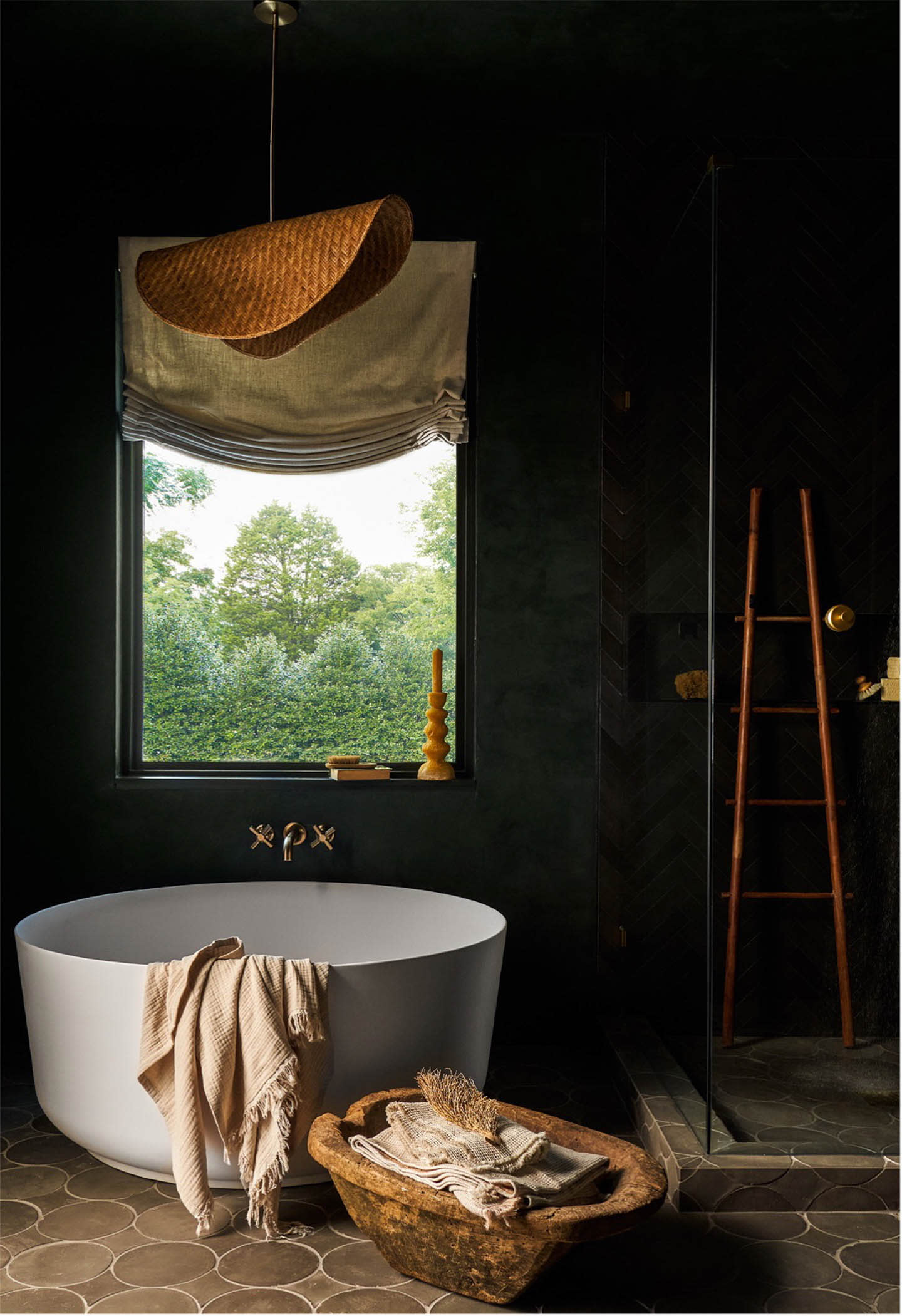 dark green tile bathroom with brown finishes