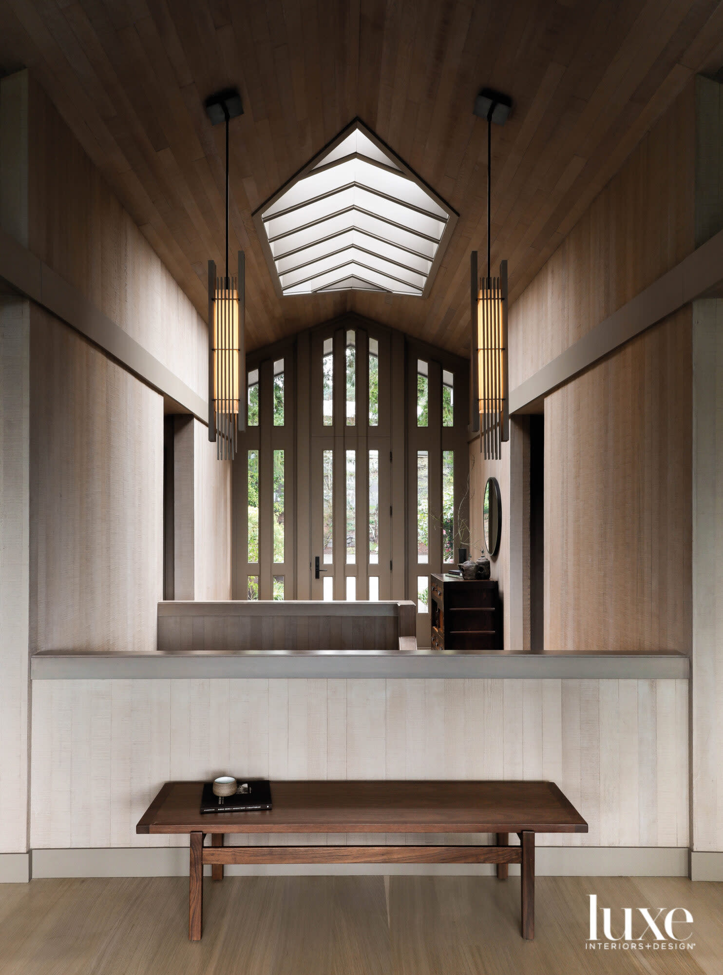 Front entry of home with skylight and front door