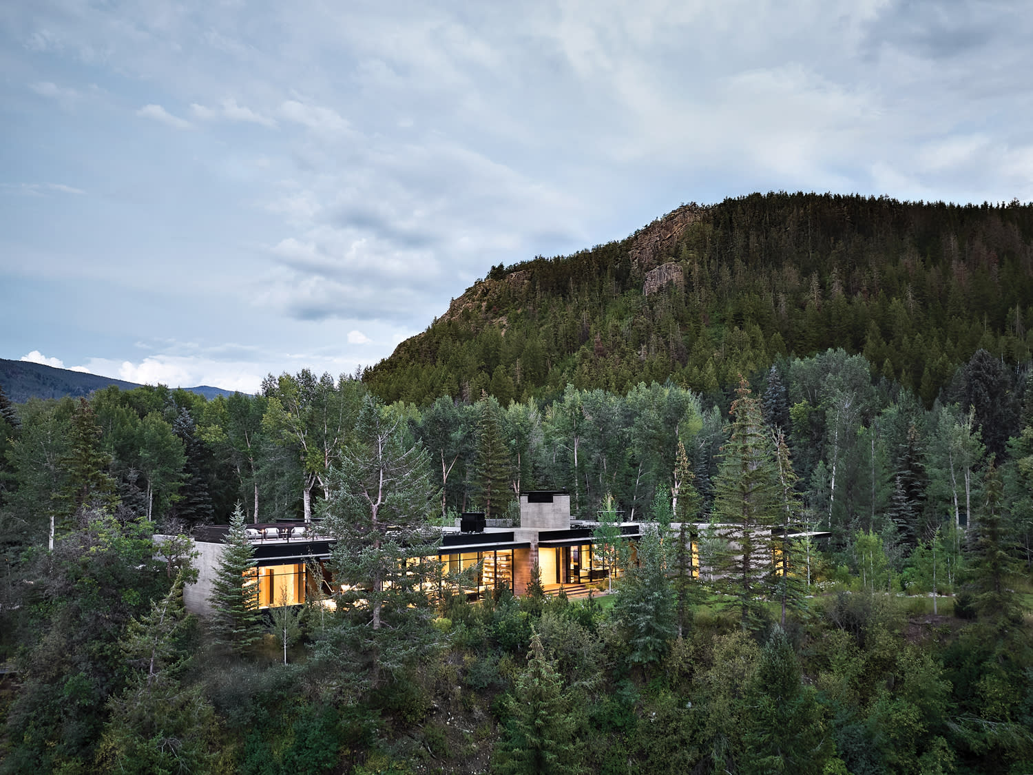 birds eye view of a Colorado mountain home surrounded by an Aspen forest