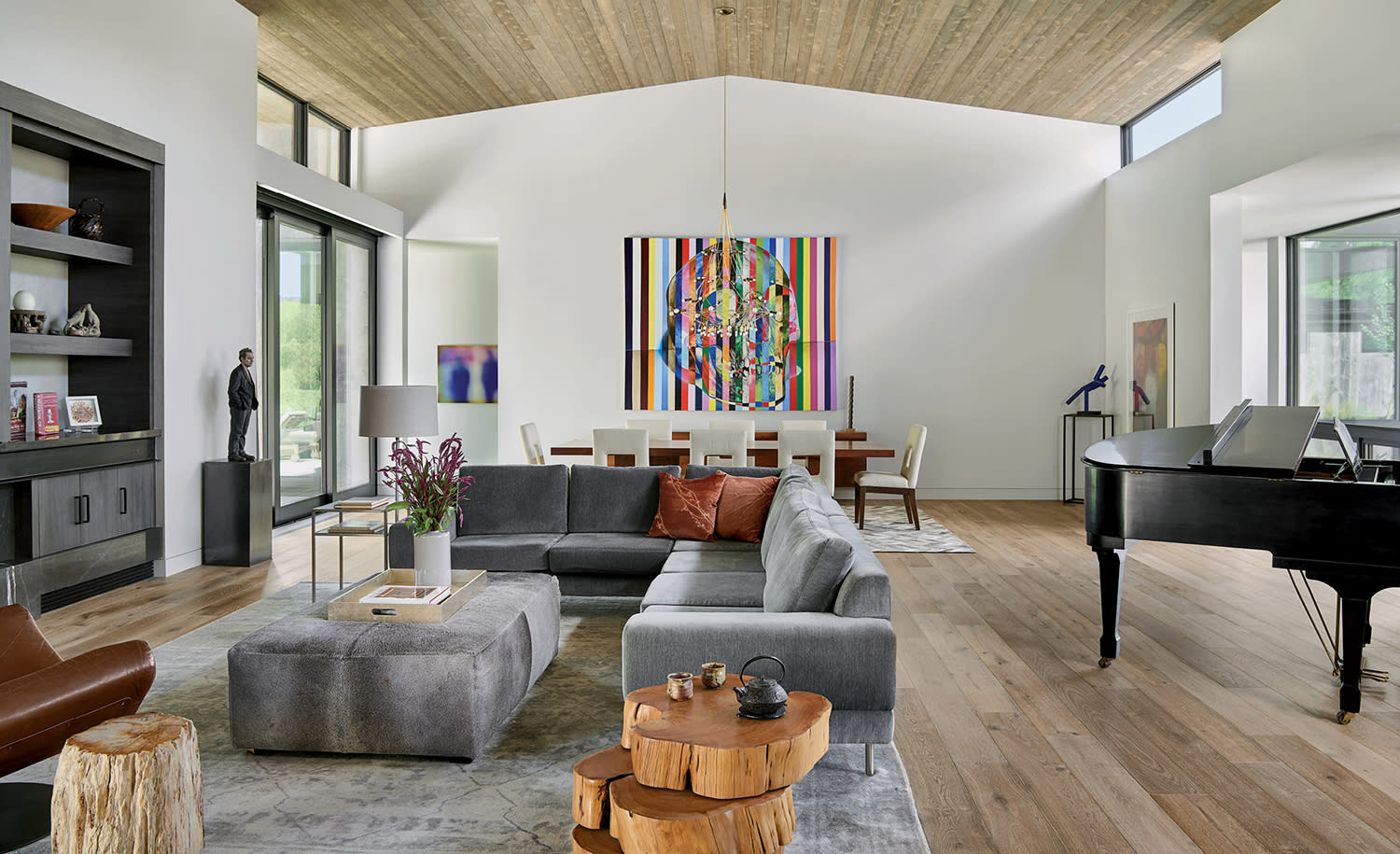 contemporary great room with a vibrant artwork and a piano