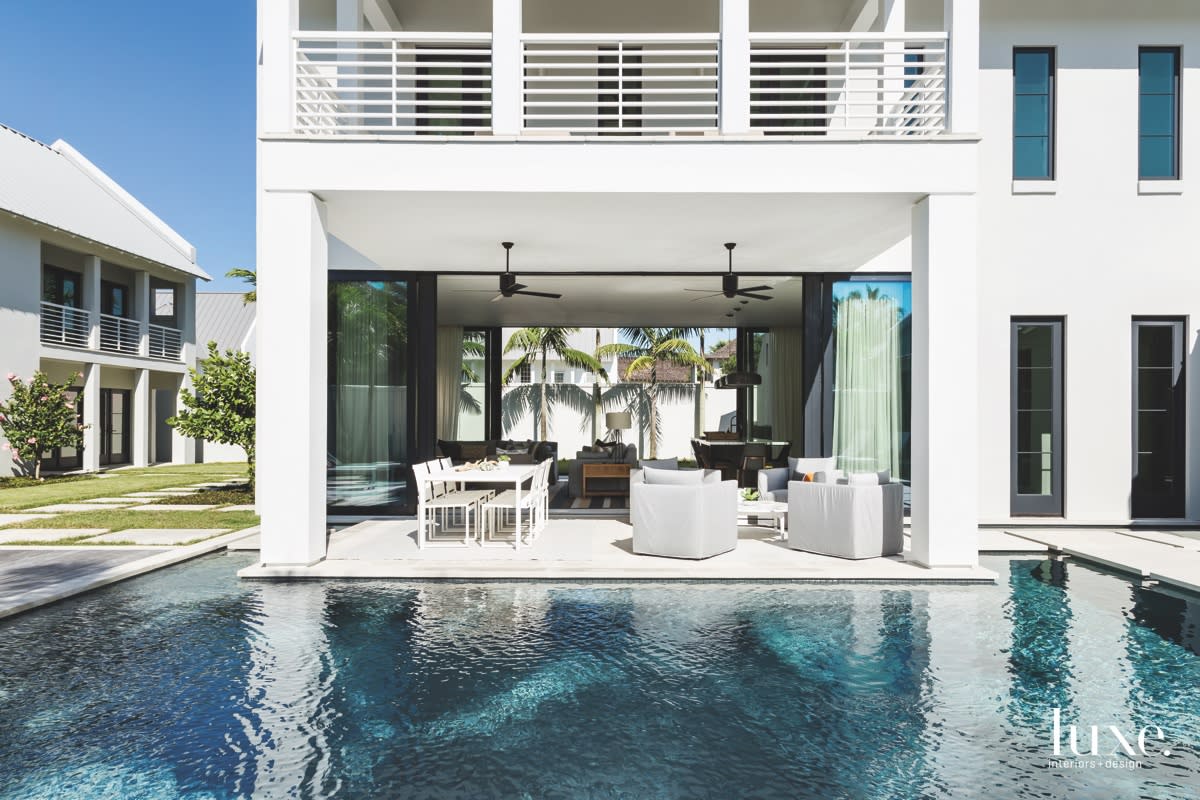 mid-century modern white outdoor pool sitting area vero beach