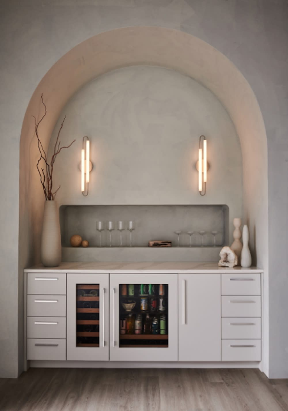 A decorative bar area with a wine rack and cooler, perfect for storing and chilling your favorite wines.