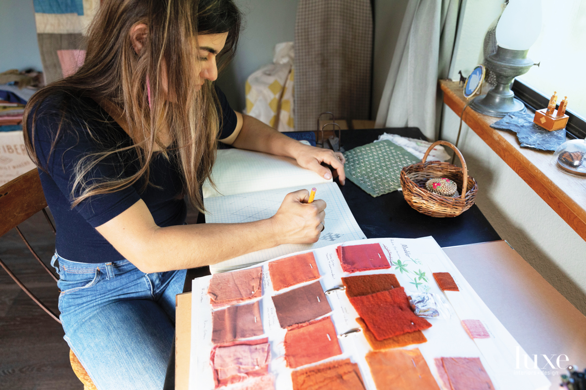 Ambrose often maps her patterns onto graph paper before cutting the fabric.