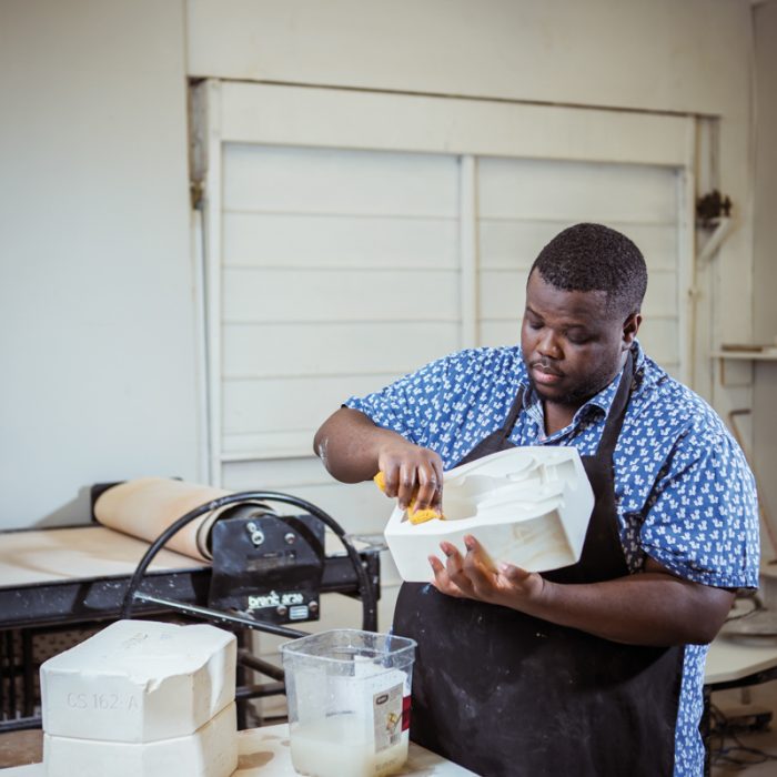 Miami artist Morel Doucet works on his ceramic pieces at his studio at the Bakehouse Art Complex.