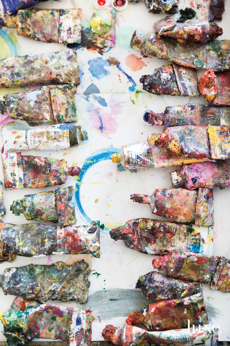 Other studio staples are well-used tubes of oil paint.