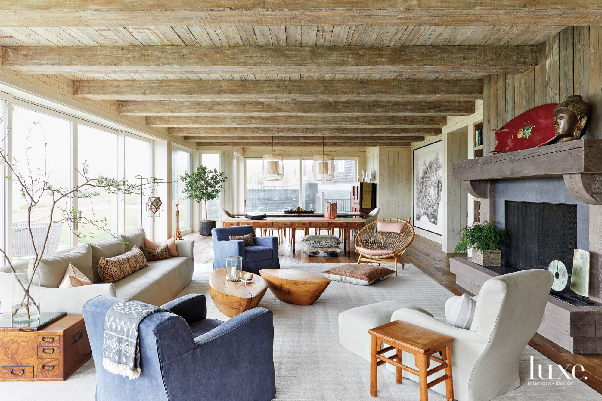 Beachy wood planks define the cieling in the spacious living room