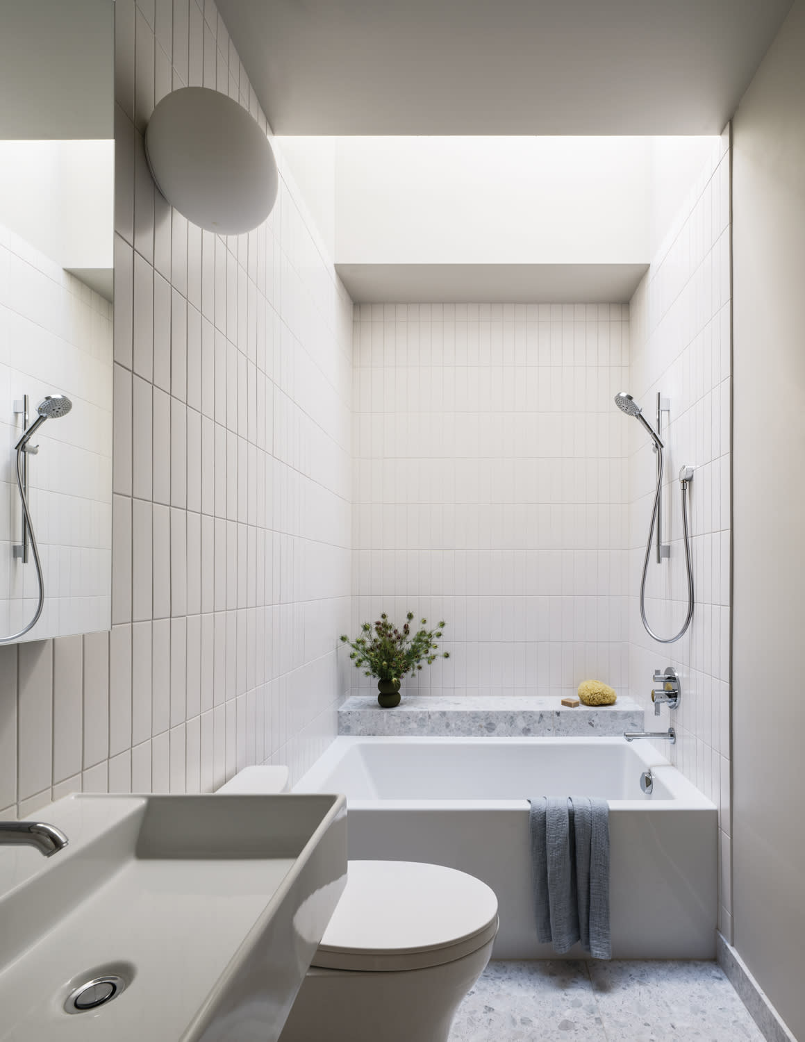 clean-lined white contemporary bathroom