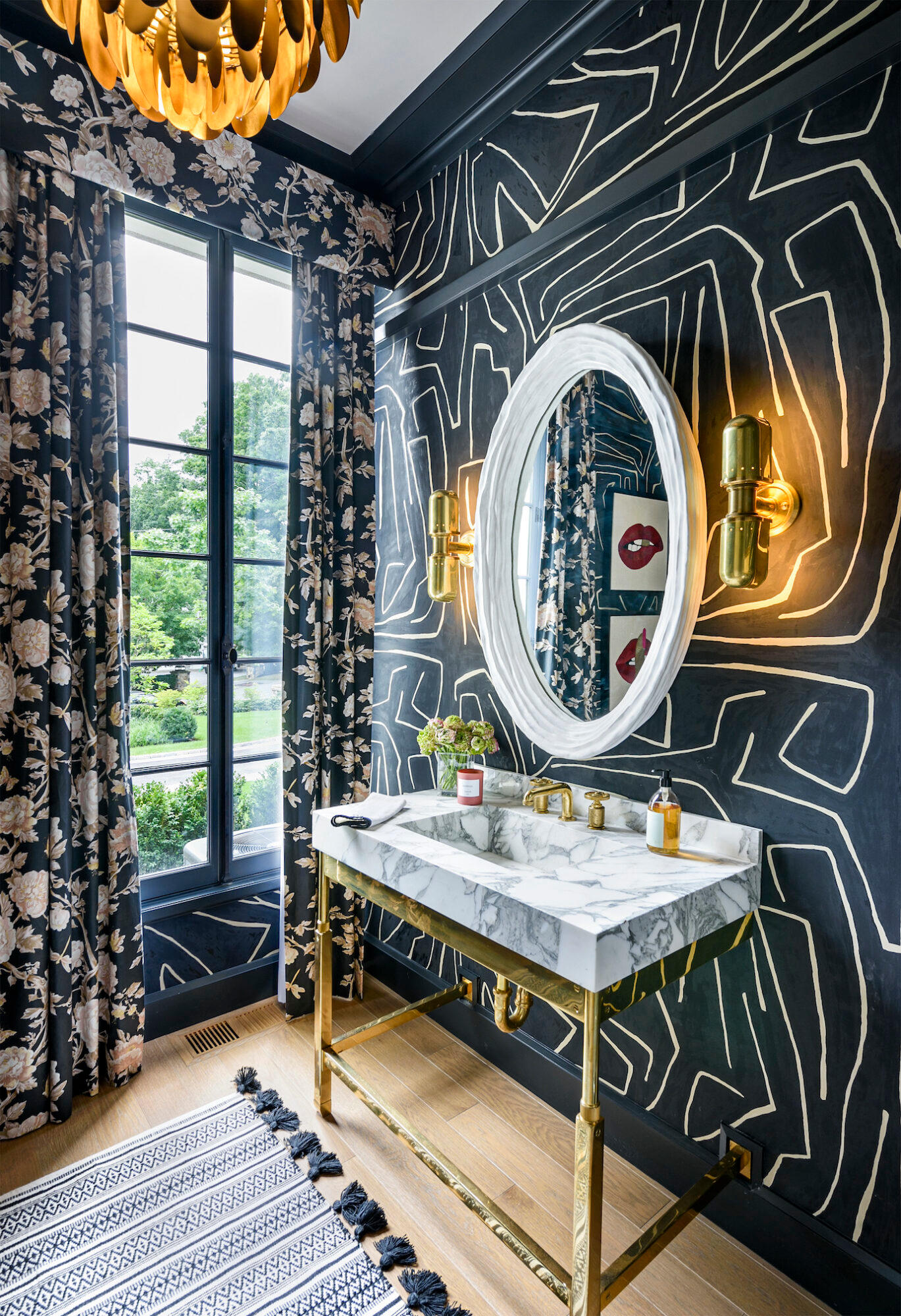 powder room featuring graphic wallpaper and floral draperies