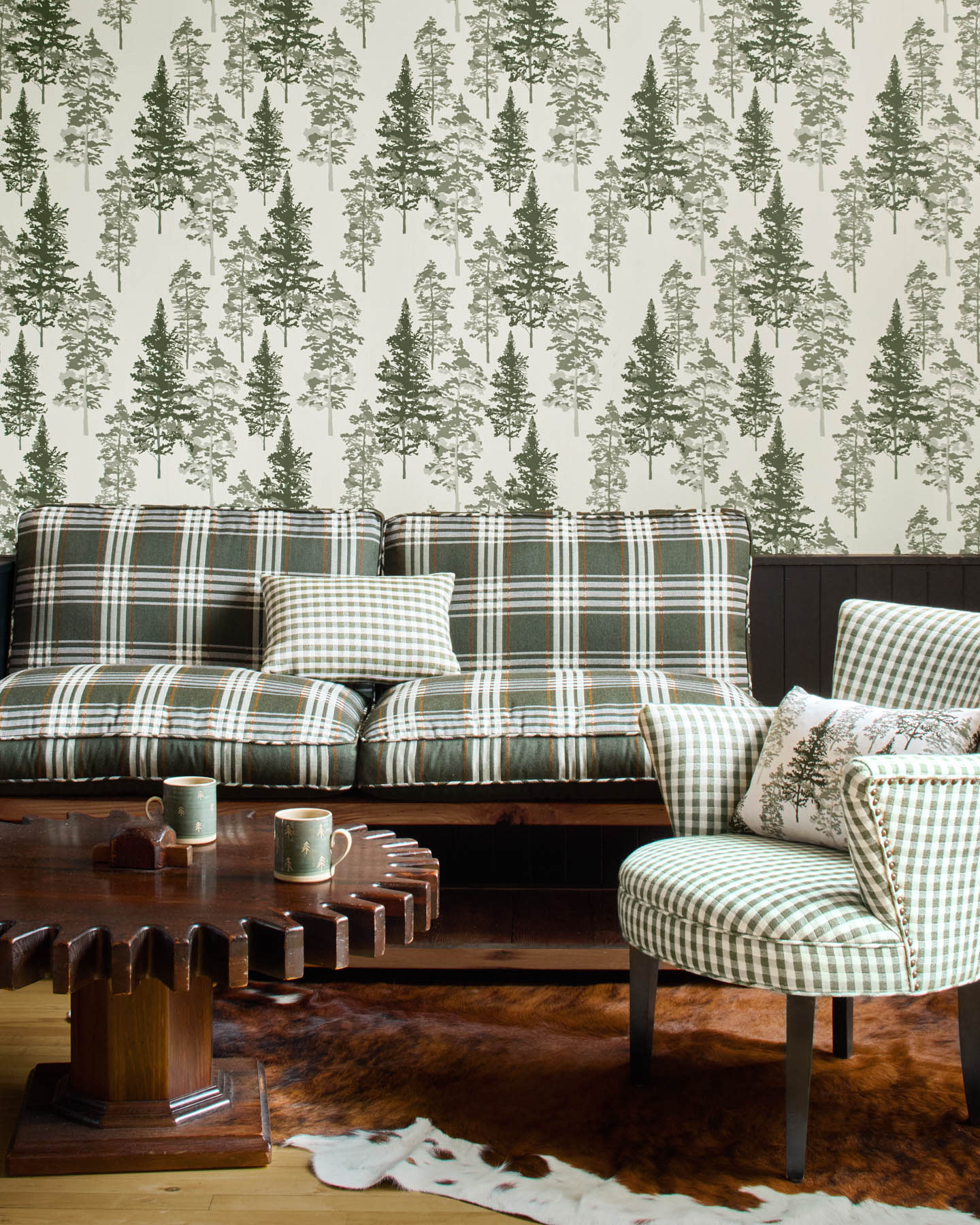 seating area with tree-motif wallpaper