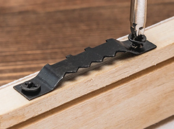 Attach-a-sawtooth-bracket-to-your-canvas