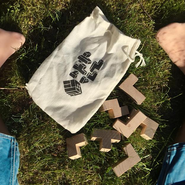 woodensquaresbrainteaserwithpouch Setting2