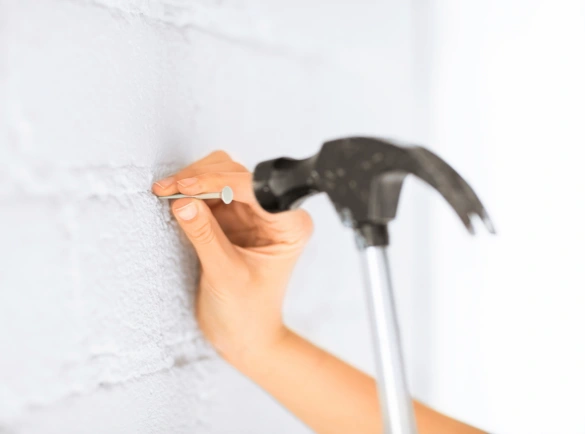 Attach-the-hook-or-nail-into-the-marked-spot