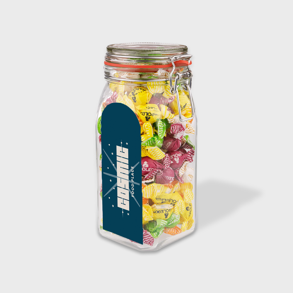 Grand bocal en verre rempli de bonbons