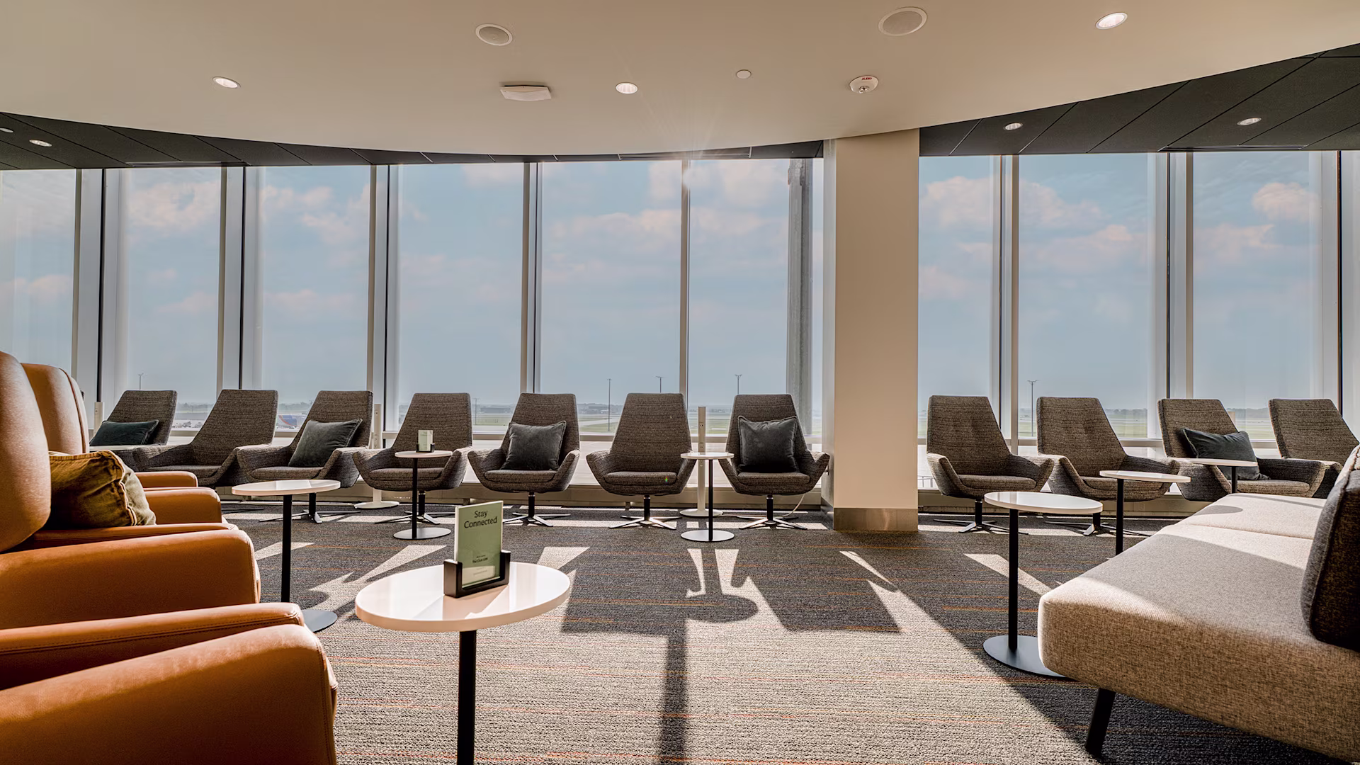 The Club airport lounge seating area