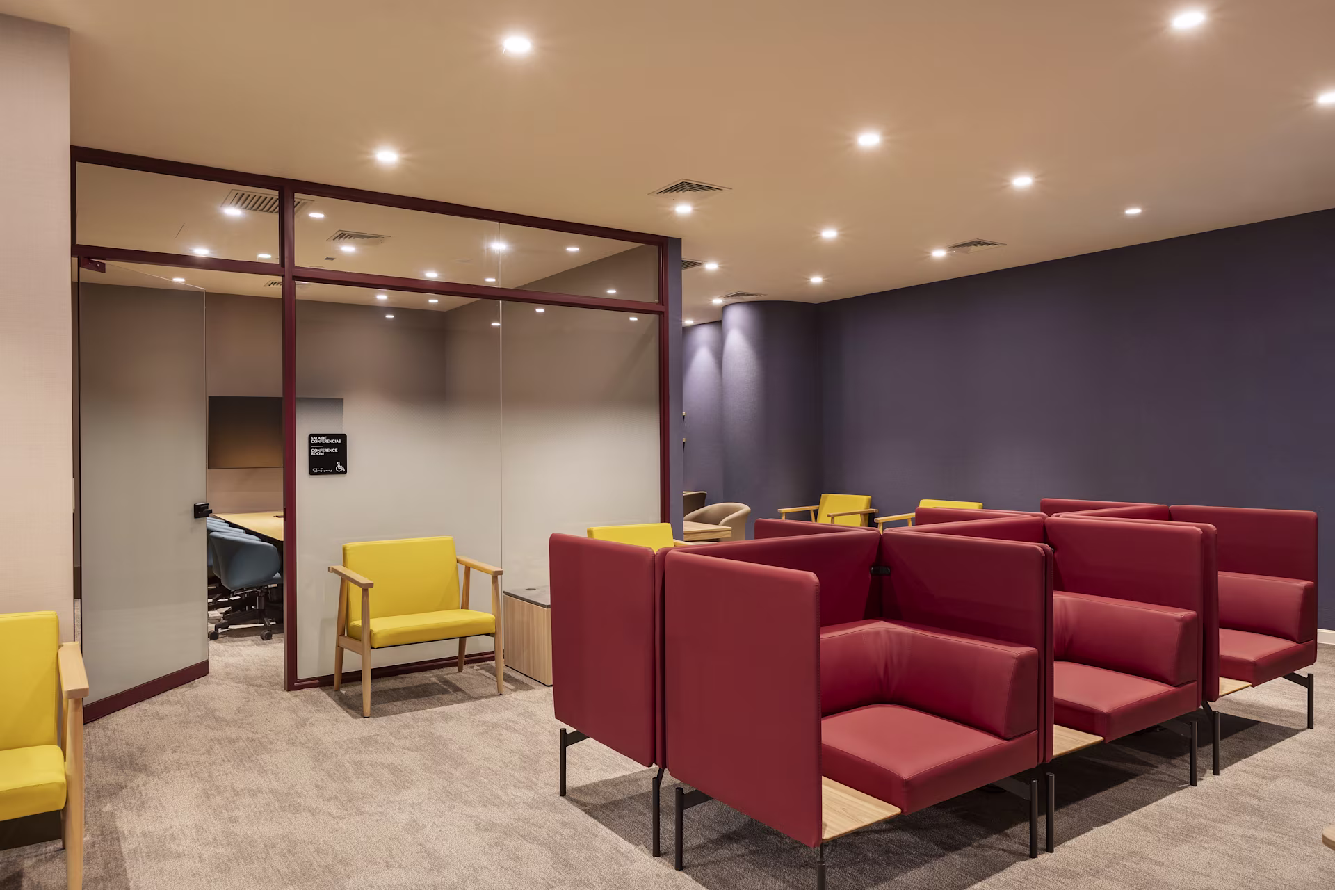 Seating area with booth seating in airport lounge in Jorge Chavez International Airport