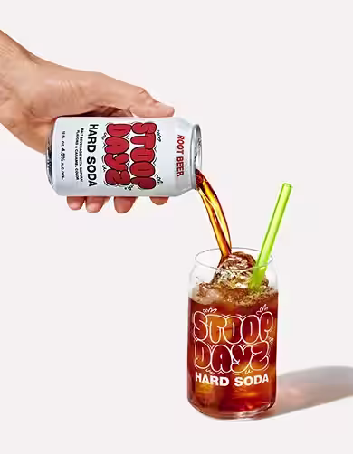 Root Beer Stoop Dayz Hard Soda being poured into a glass
