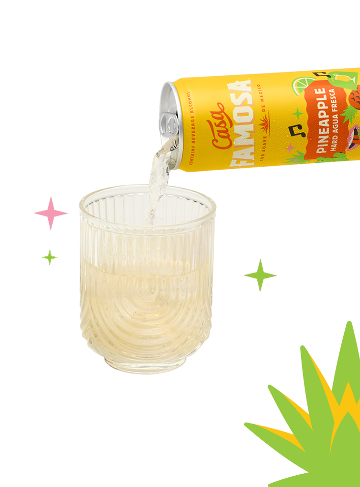 Pineapple Casafamosa being poured into a glass.