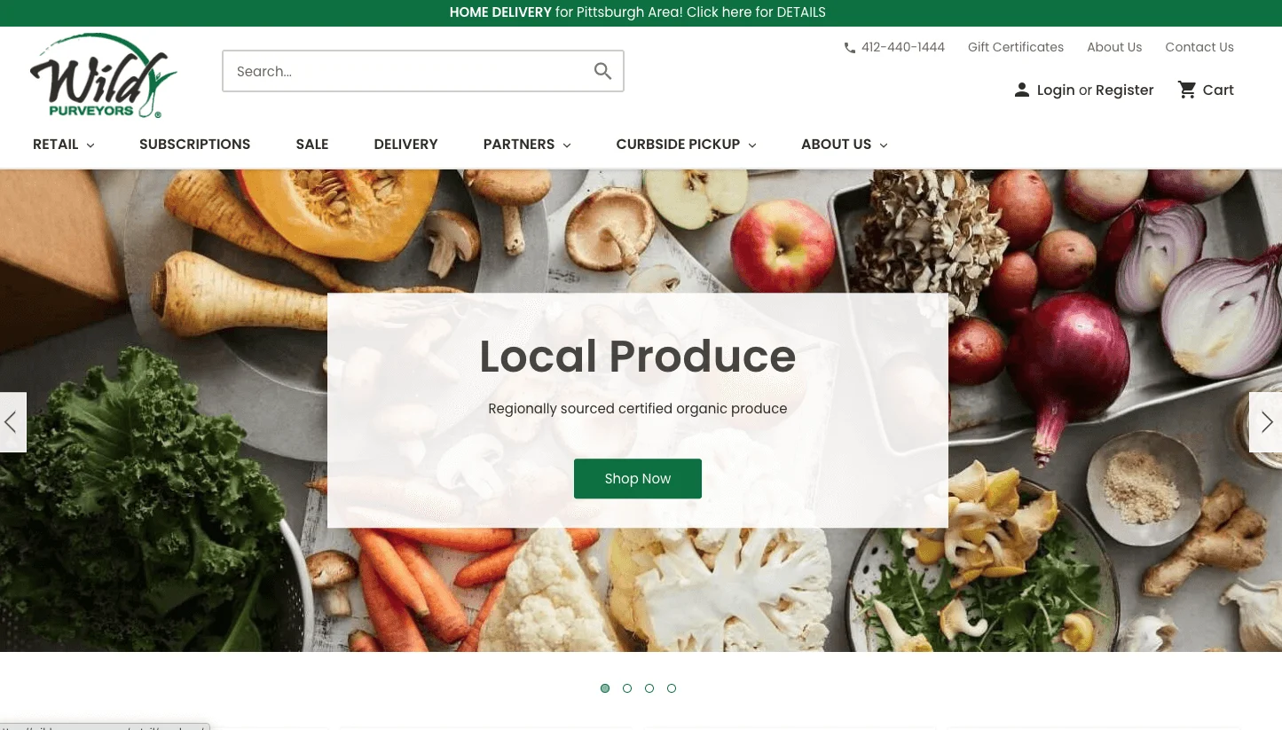 Assorted fresh vegetables including kale, carrots, cauliflower, onions, apples, and mushrooms arranged on a kitchen counter.
