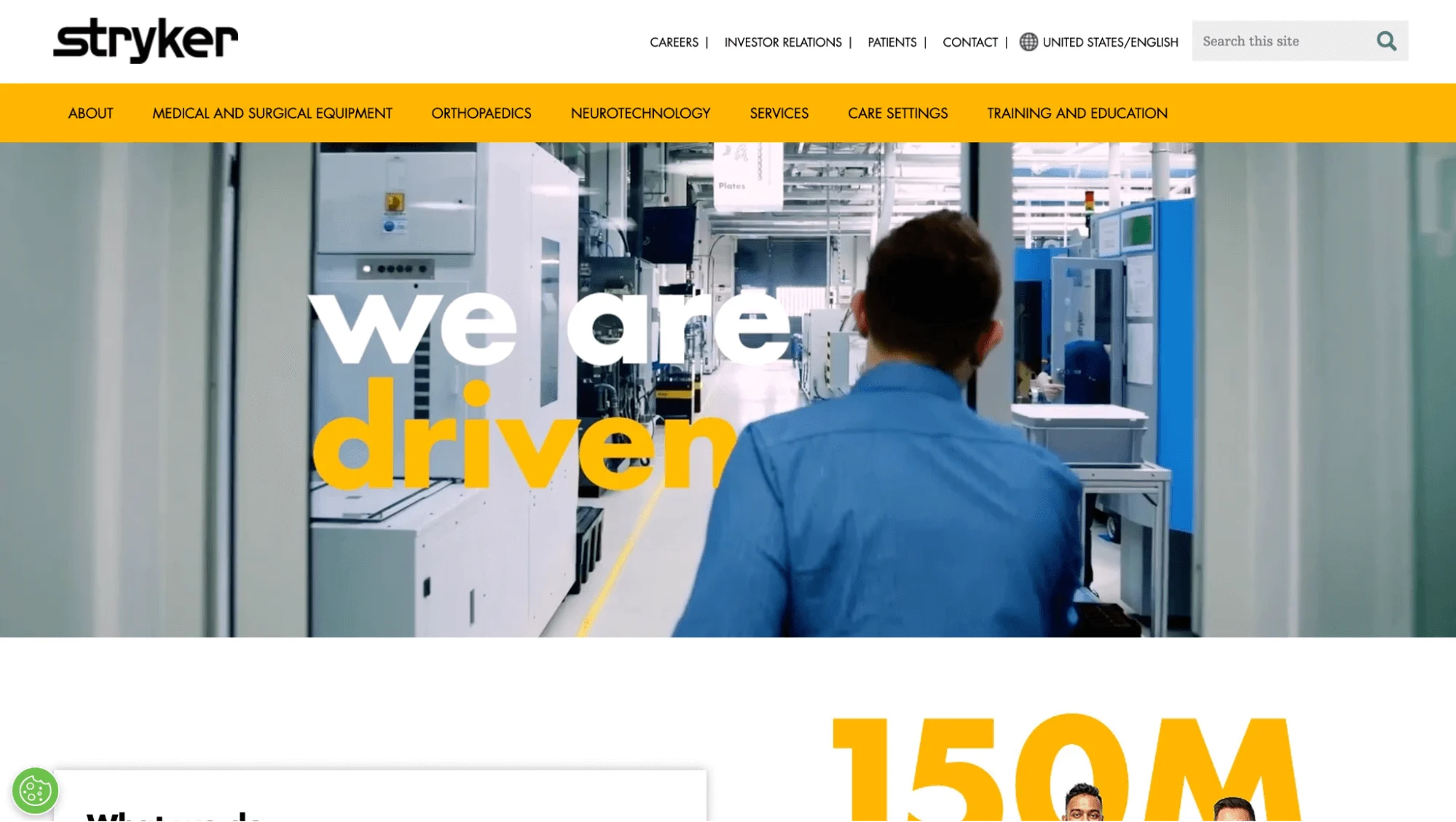 Stryker Homepage with man in blue shirt walking lab with text that reads "we are driven"