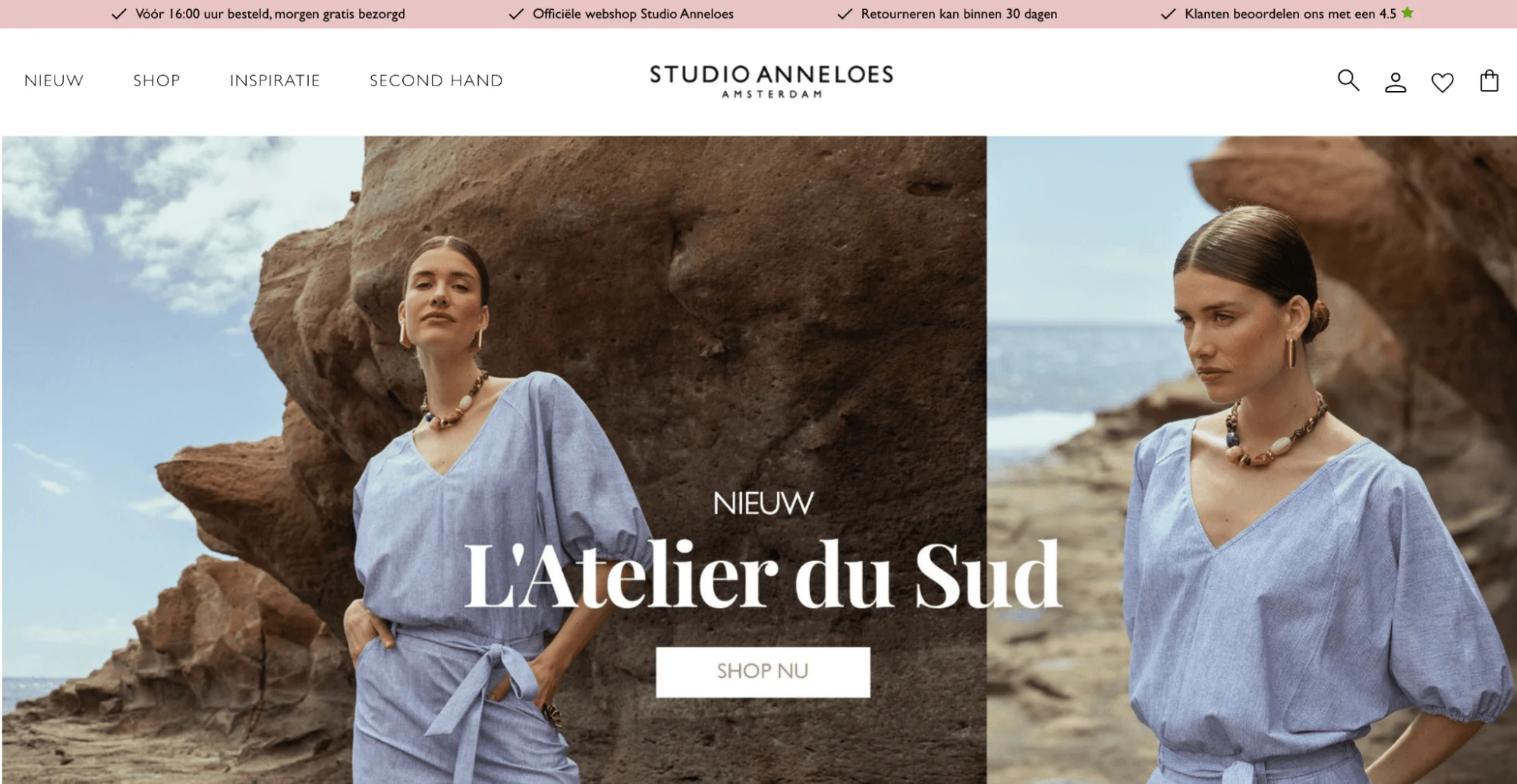 Fashion model in a blue Studio Anneloes outfit posing against a rocky coastal background with "L'Atelier du Sud" text.