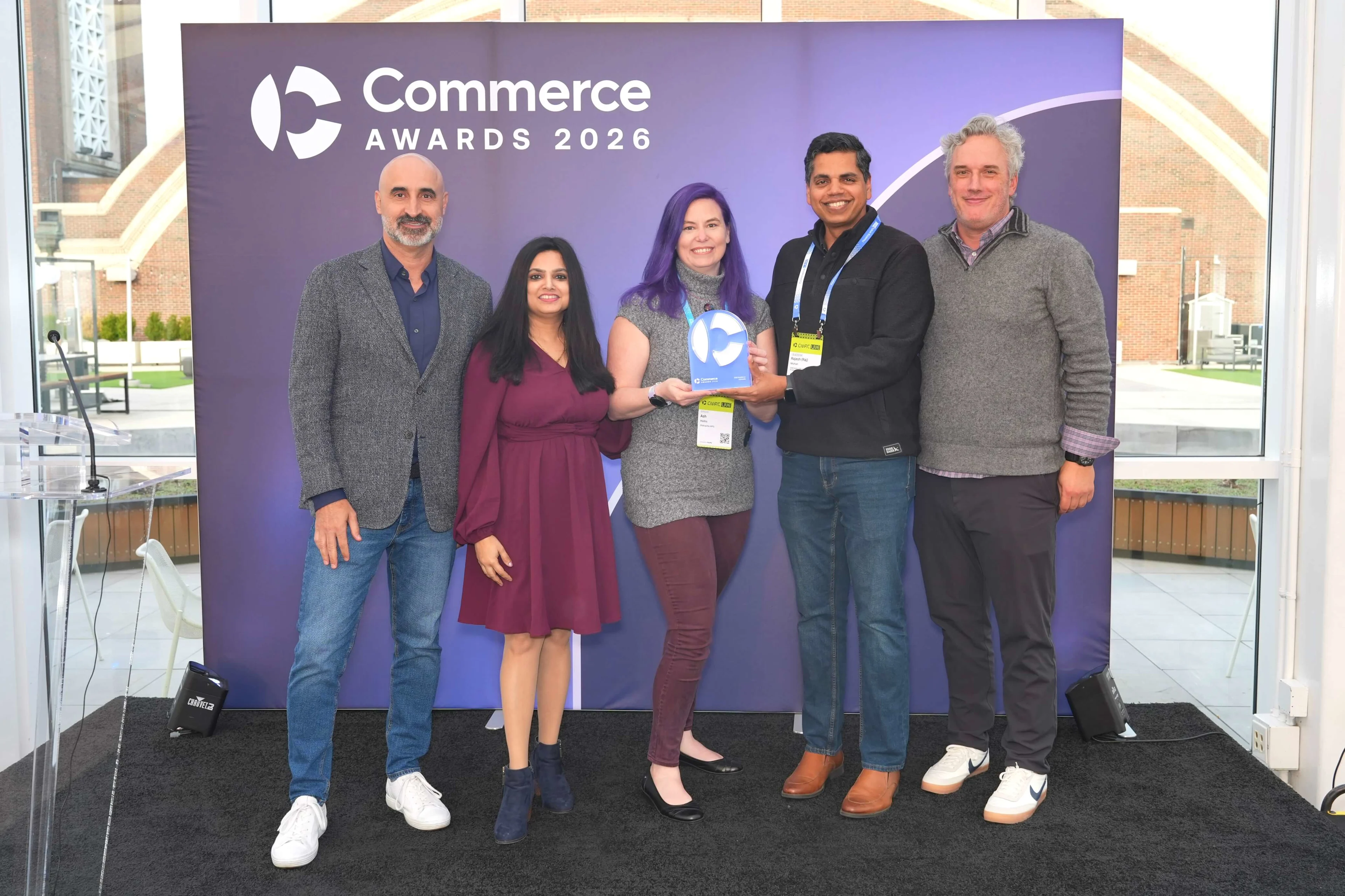 The Oldcastle APG team accepts their Commerce 2026 award.
