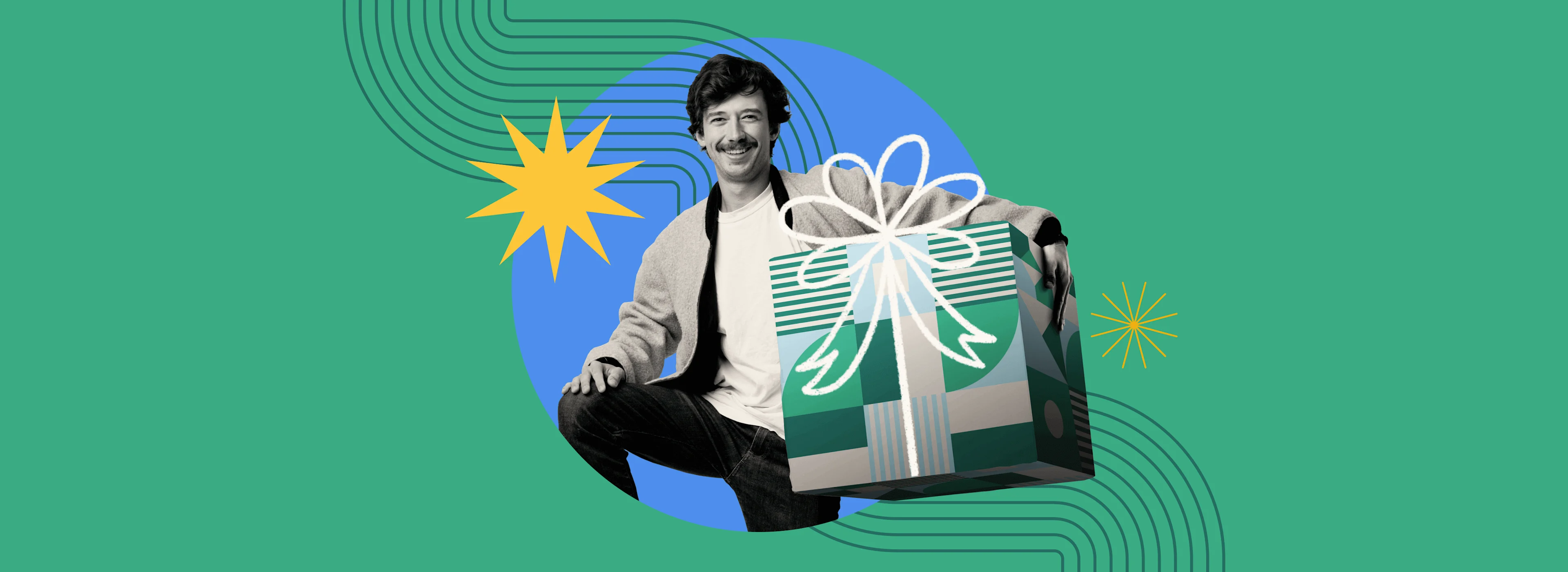Smiling man with mustache sits beside a large gift box with a bow on a green and blue graphic background with yellow stars.