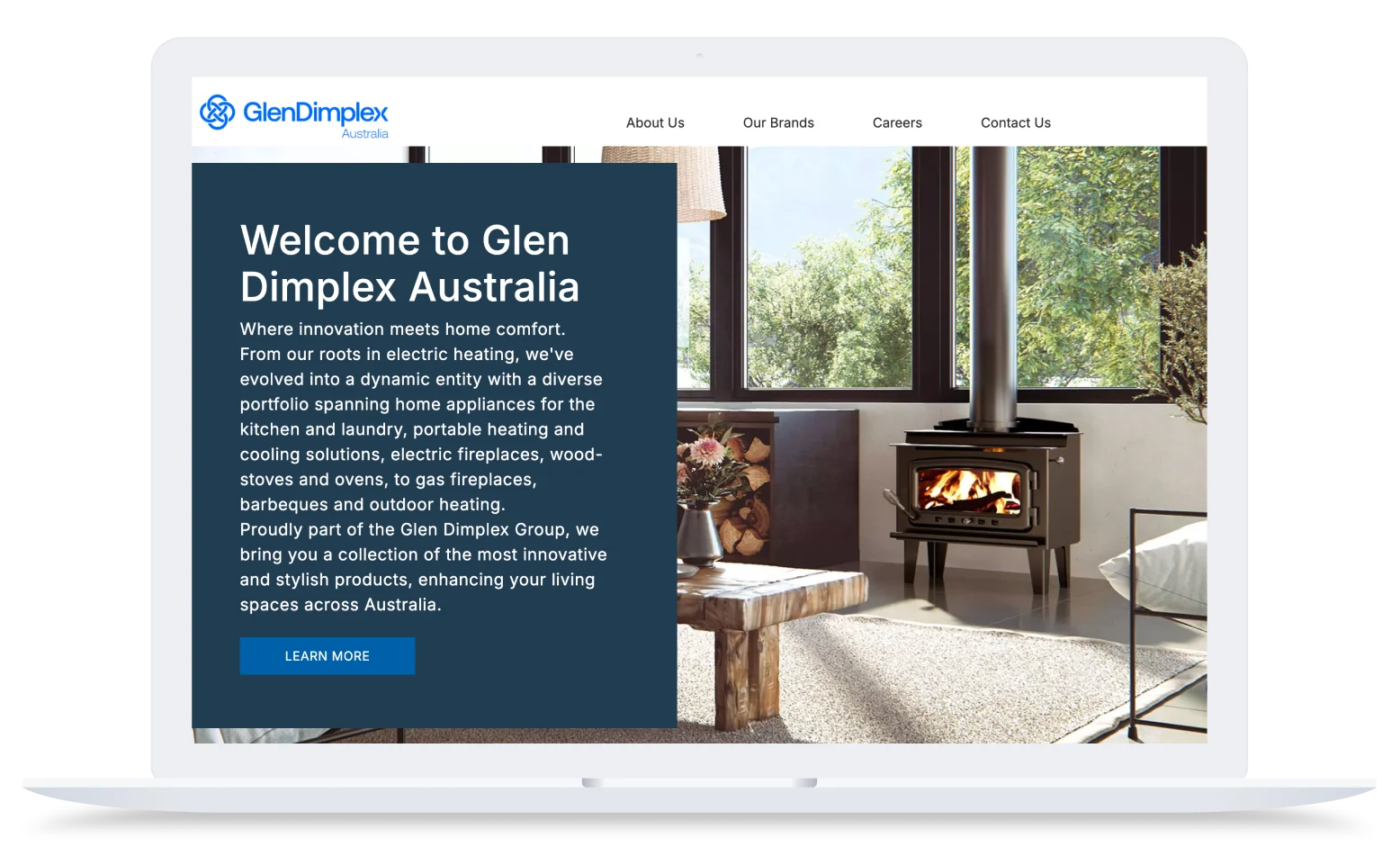 Glen Dimplex Australia homepage displayed on a laptop, highlighting the company’s range of home appliances including electric fireplaces and heating solutions.