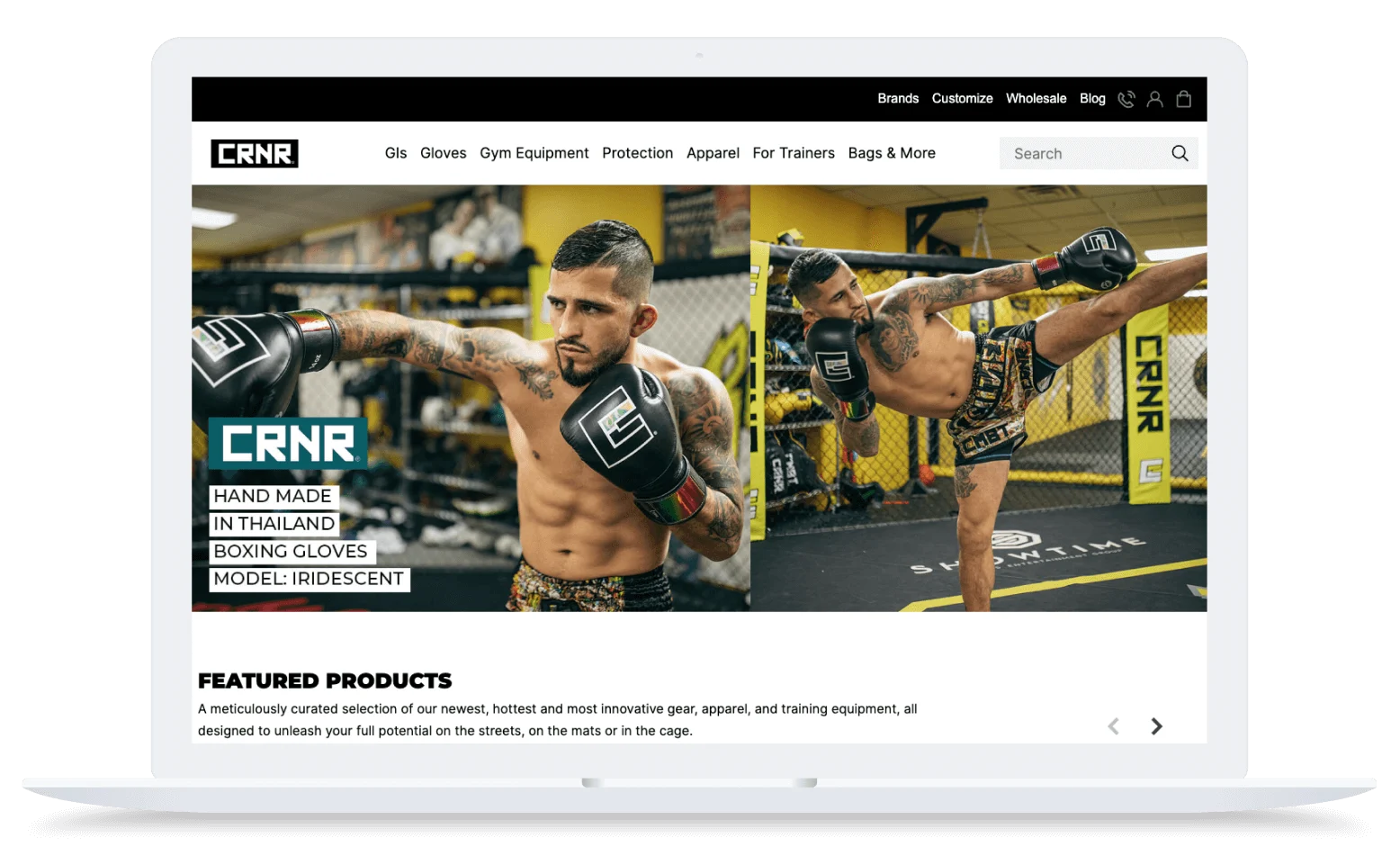 A male fighter wearing black boxing gloves and shorts practices kicks in a yellow and black gym training area.