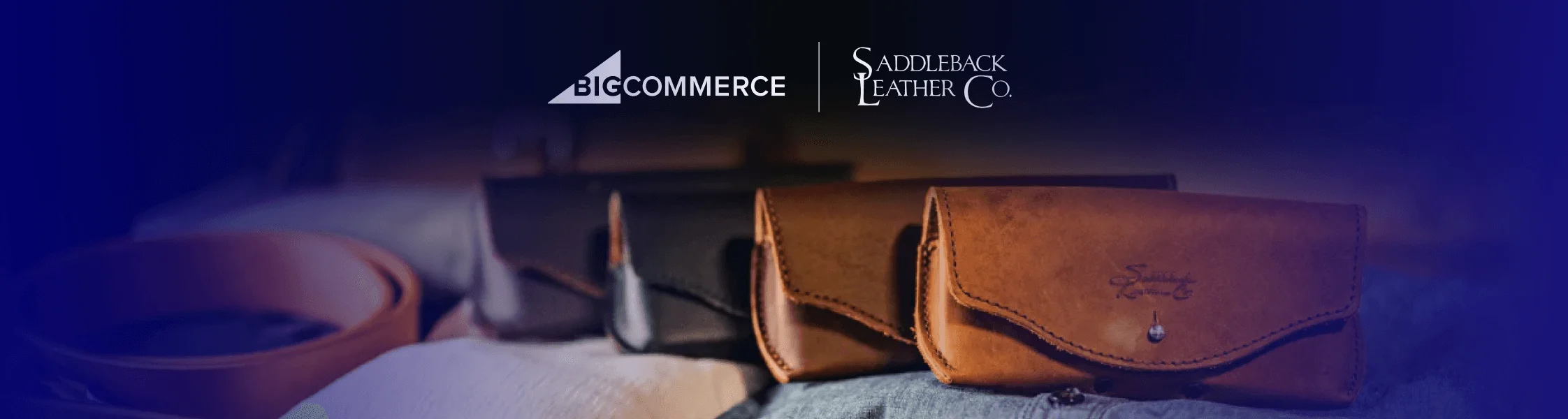 Four leather bags lined up on display with BigCommerce and Saddleback Leather Co logos