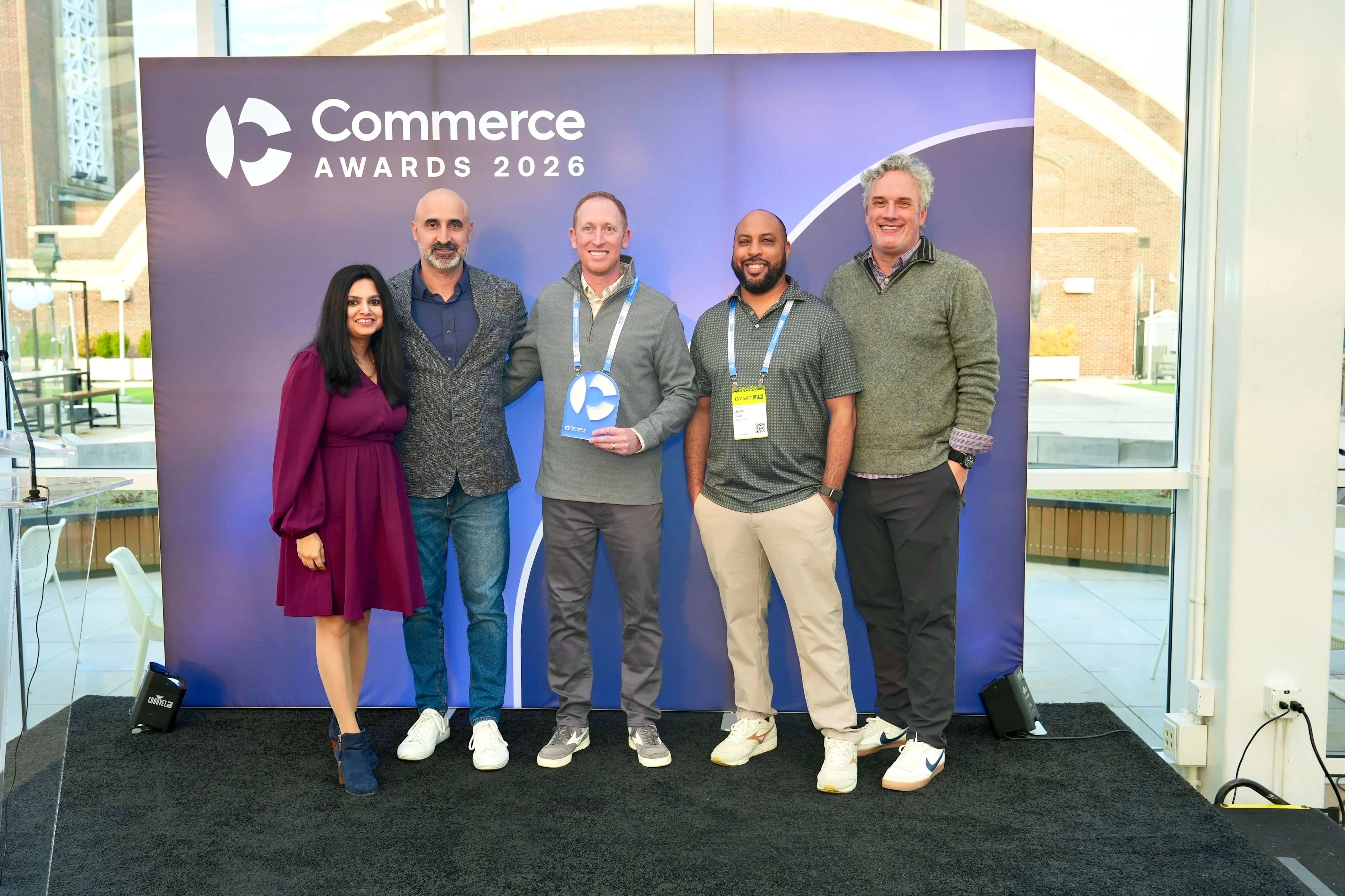 The Mizuno USA team accepting their Growth Champion award from Commerce.